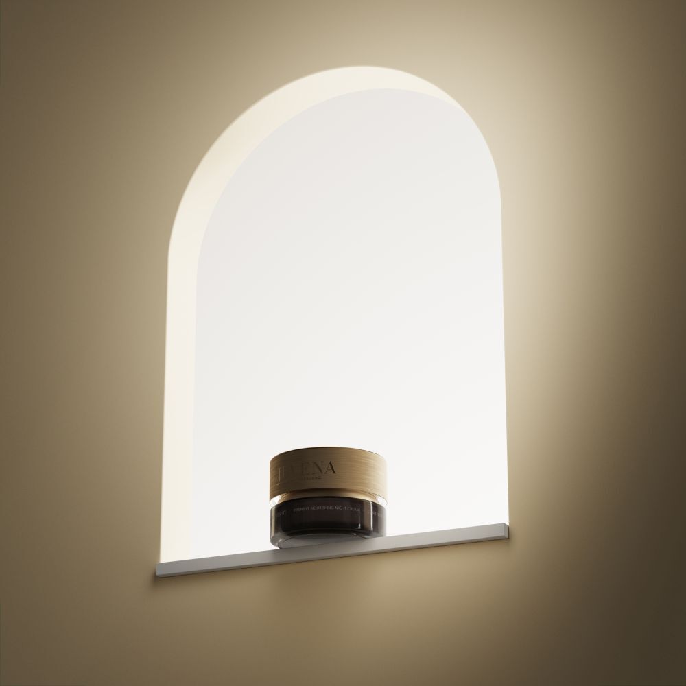 Creme-Dose mit goldenem Deckel in einer Nische. Aufschrift: JUVENA. Hintergrund: hell.
