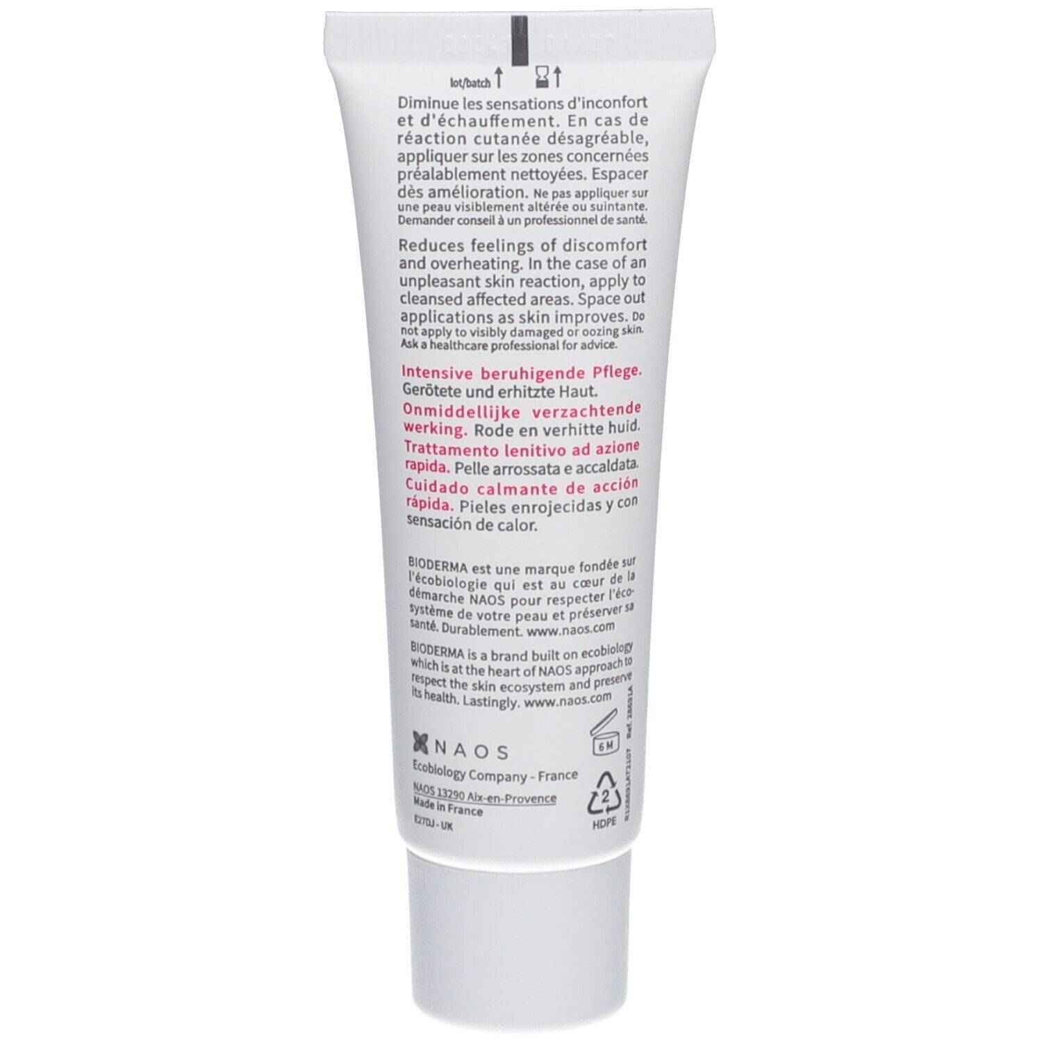 Rückseite einer weißen Tube. Text in mehreren Sprachen. Herstellerinformationen und Symbole.