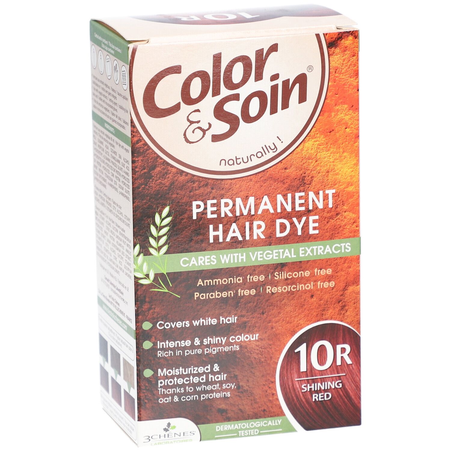 Haarfärbemittel-Verpackung. Aufschrift: Color & Soin, Permanent Hair Dye, 10R Shining Red. Frei von Ammoniak, Silikon, Parabenen und Resorcinol.