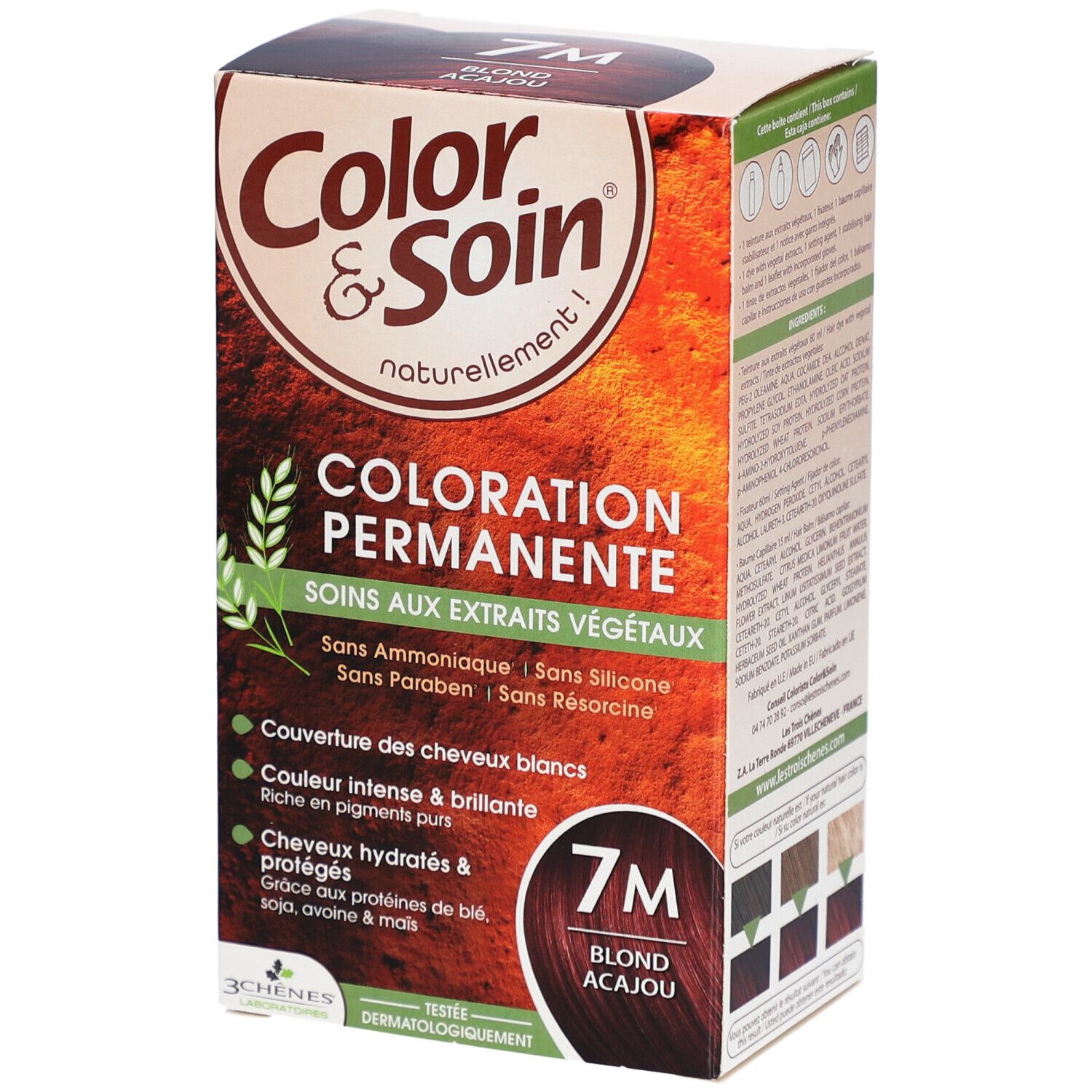 Boîte de coloration capillaire. Inscription : Coloration Permanente, 7M Blond Acajou. Contient des extraits végétaux. Échantillons de couleurs.