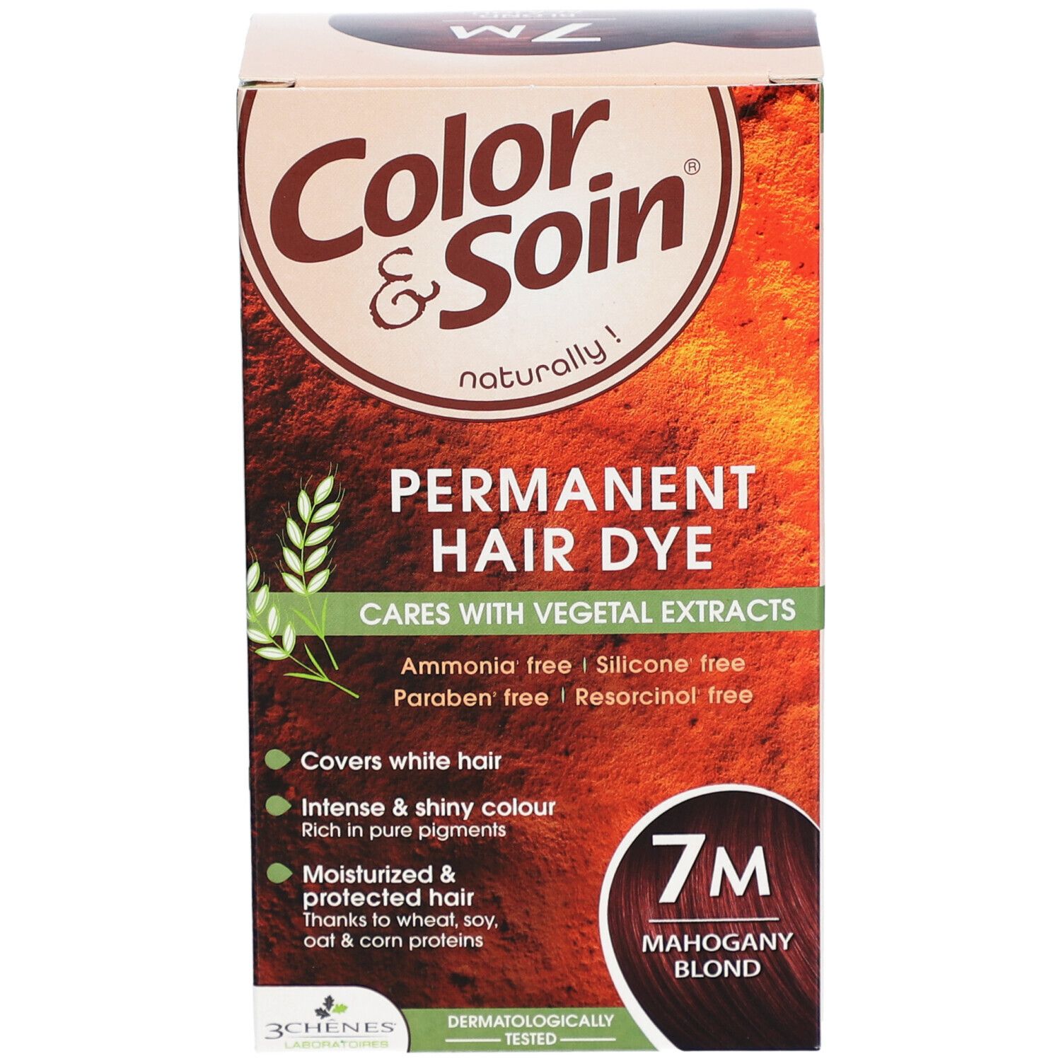 Boîte de coloration capillaire. Inscription : Color & Soin, Permanent Hair Dye, 7M Mahagoni-Blond. Contient des extraits végétaux.