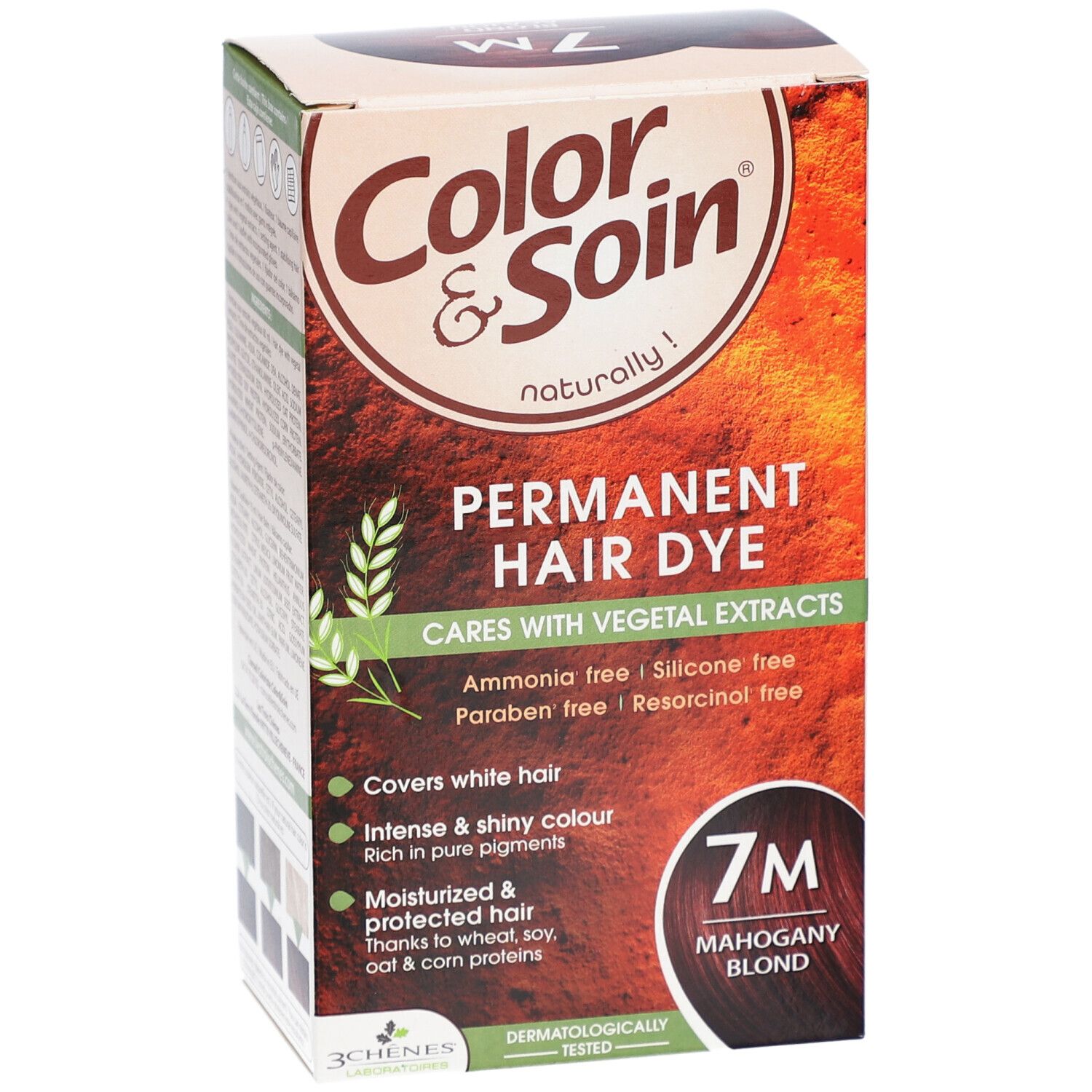 Boîte de coloration capillaire. Inscription : Color & Soin, Permanent Hair Dye, 7M Mahagoni-Blond. Contient des extraits végétaux.