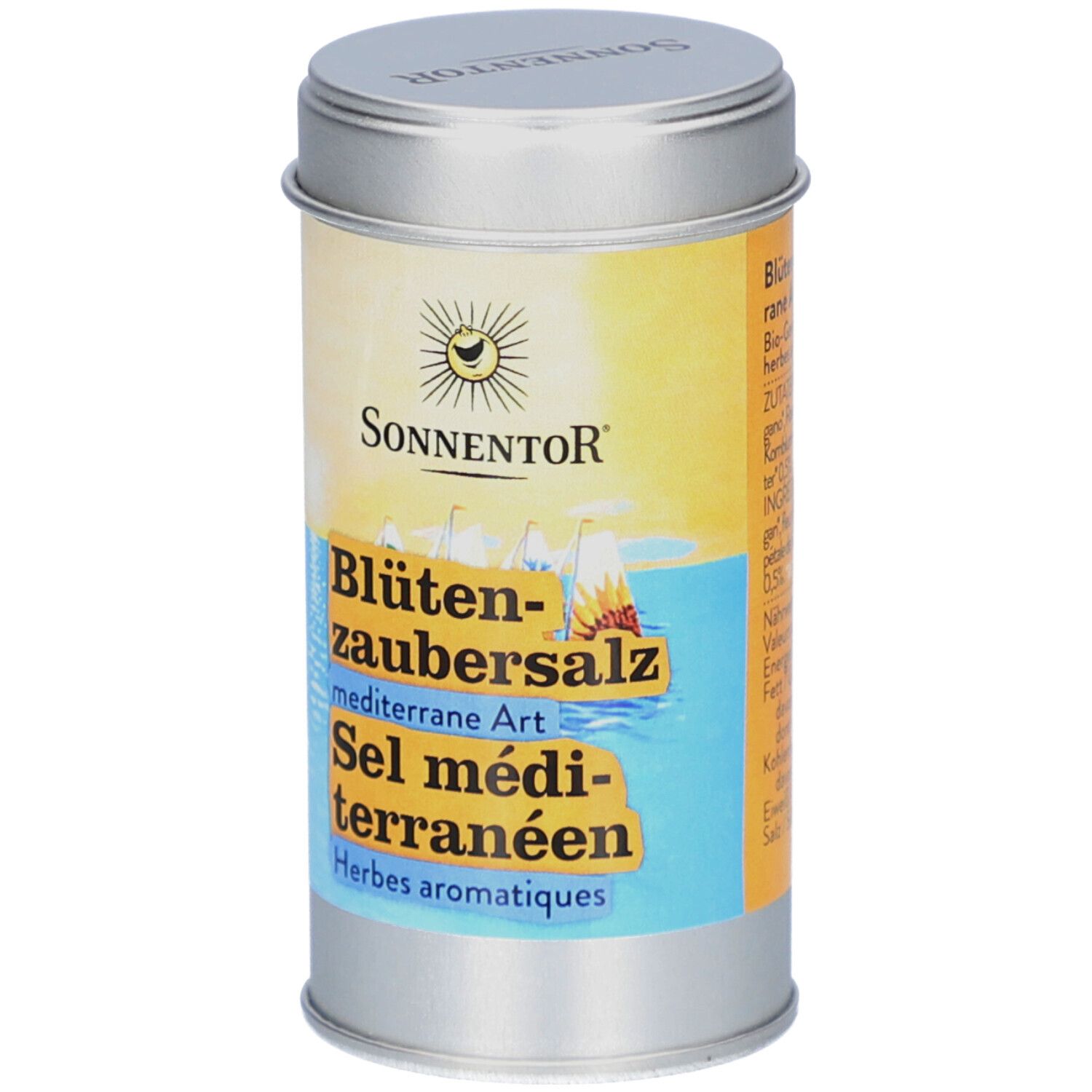 Boîte cylindrique avec couvercle. Inscription : SONNENTOR, Blütenzaubersalz, mediterrane Art, Sel méditerranéen, Herbes aromatiques. Logo soleil.