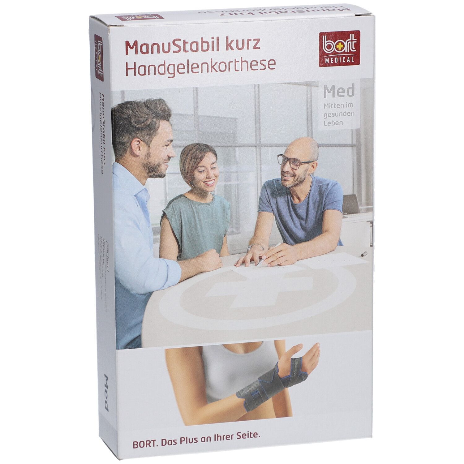 Verpackung der Handgelenkbandage. Aufdruck: ManuStabil kurz, bort MEDICAL. Abbildung: Personen am Tisch, Handgelenkbandage.