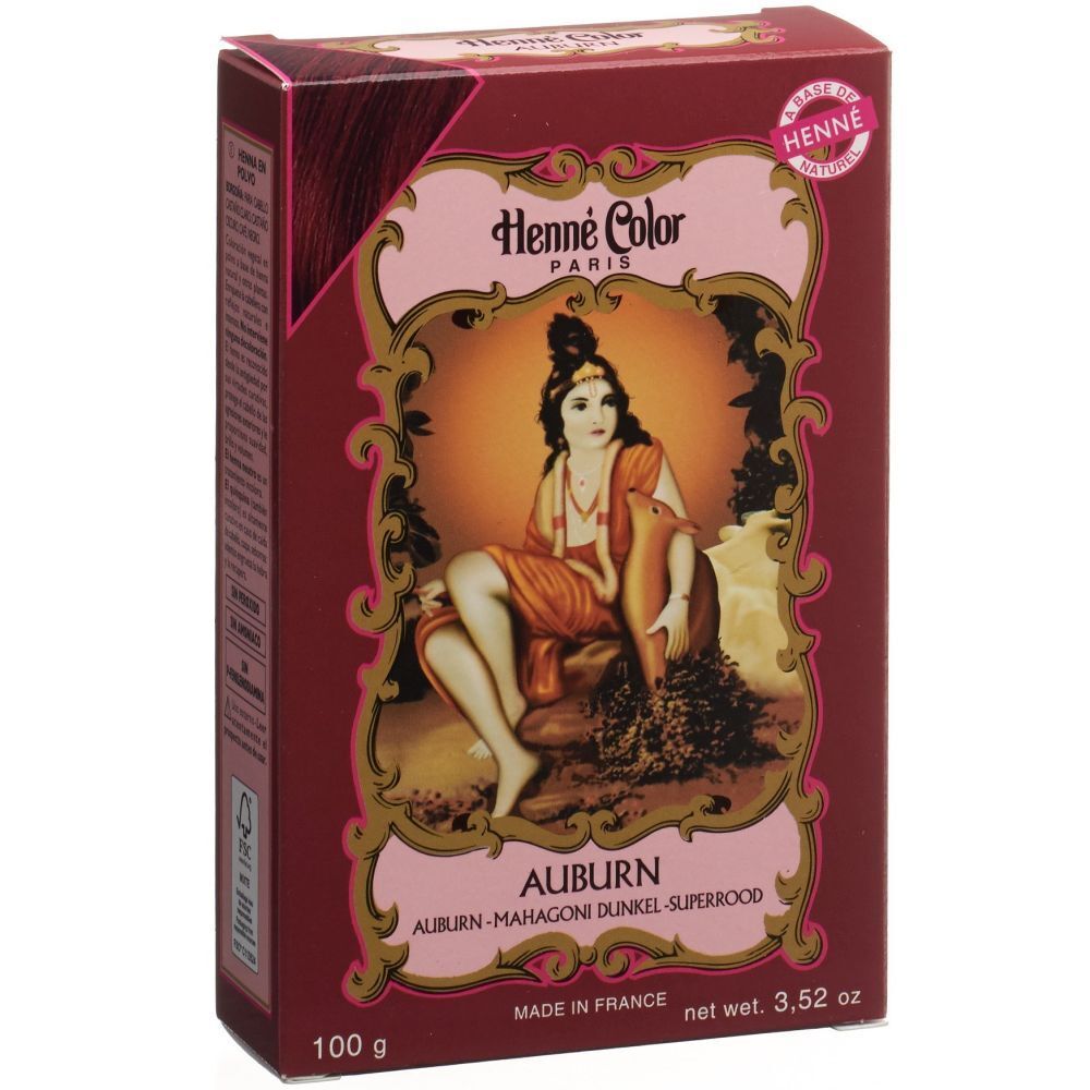 Boîte Henné Color Auburn. Image d'une femme sur fond rouge. Inscription: Auburn, Mahagoni Dunkel, Superrood.