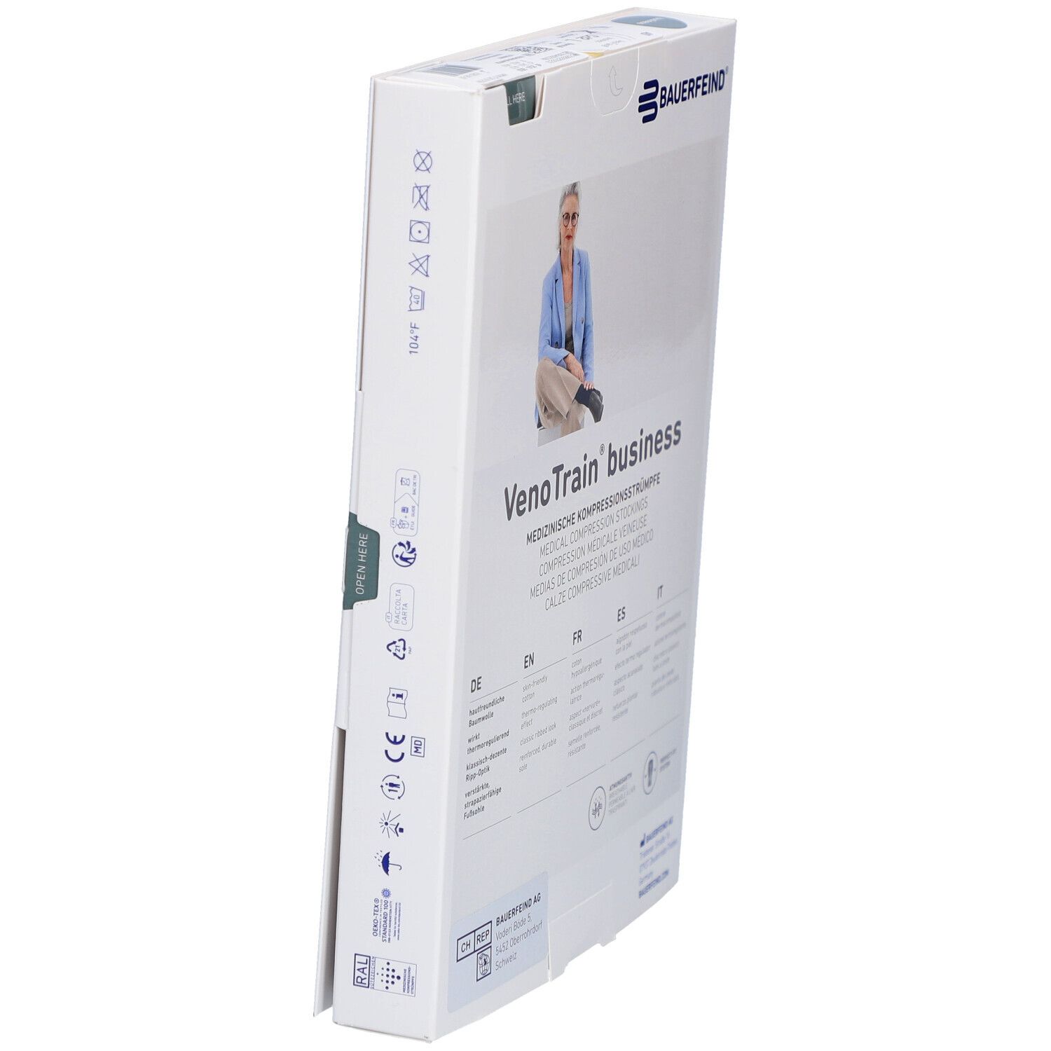 Boîte de bas de compression. Marque: BAUERFEIND VenoTrain business. Symboles de lavage et informations sur le produit.