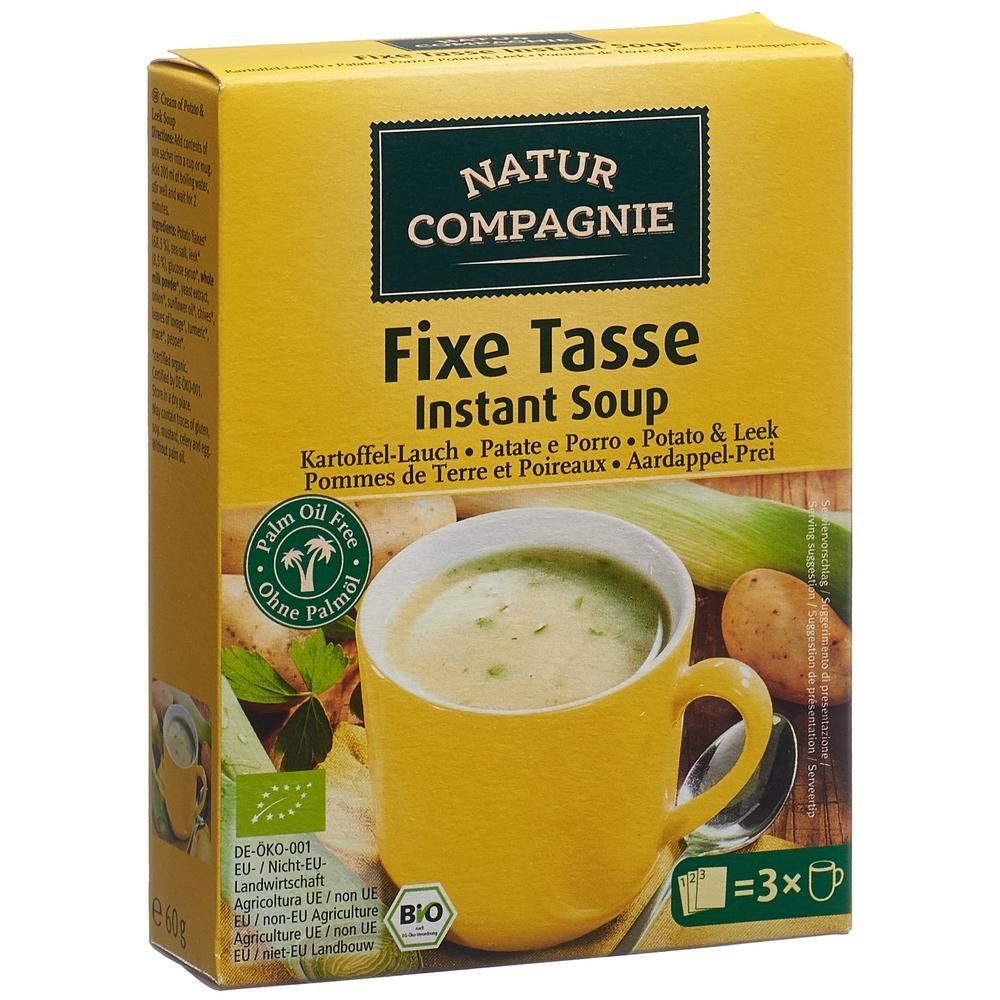 Kartonverpackung mit Natur Compagnie Fixe Tasse Instant Soup. Kartoffel-Lauch-Geschmack. Bio-Siegel. Palmölfrei. Abbildung einer Suppe in einer Tasse.