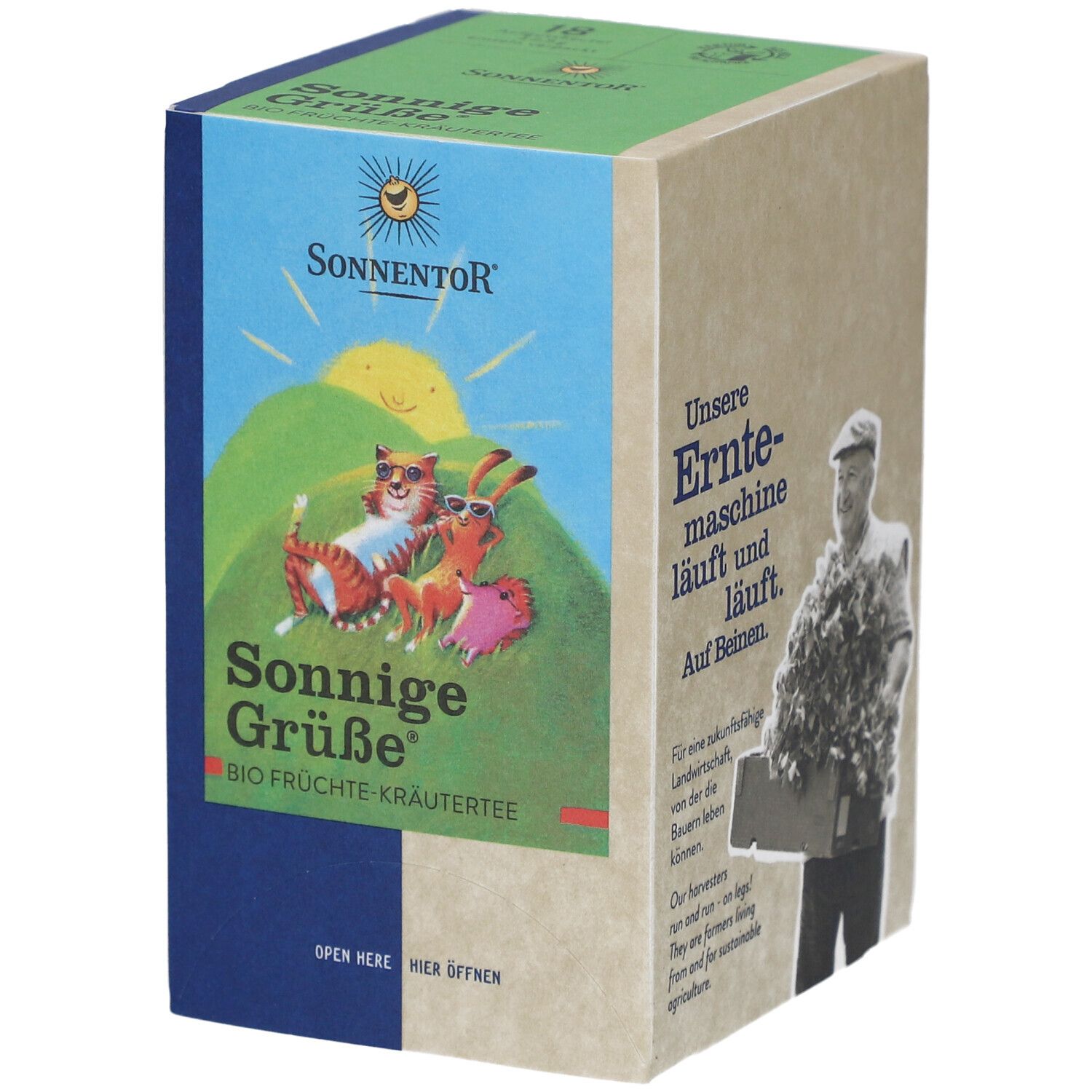 Boîte de thé SONNENTOR. Inscription : Sonnige Grüße, Bio Früchte Kräutertee. Illustration : chat, lapin, soleil. Texte : Hier öffnen.