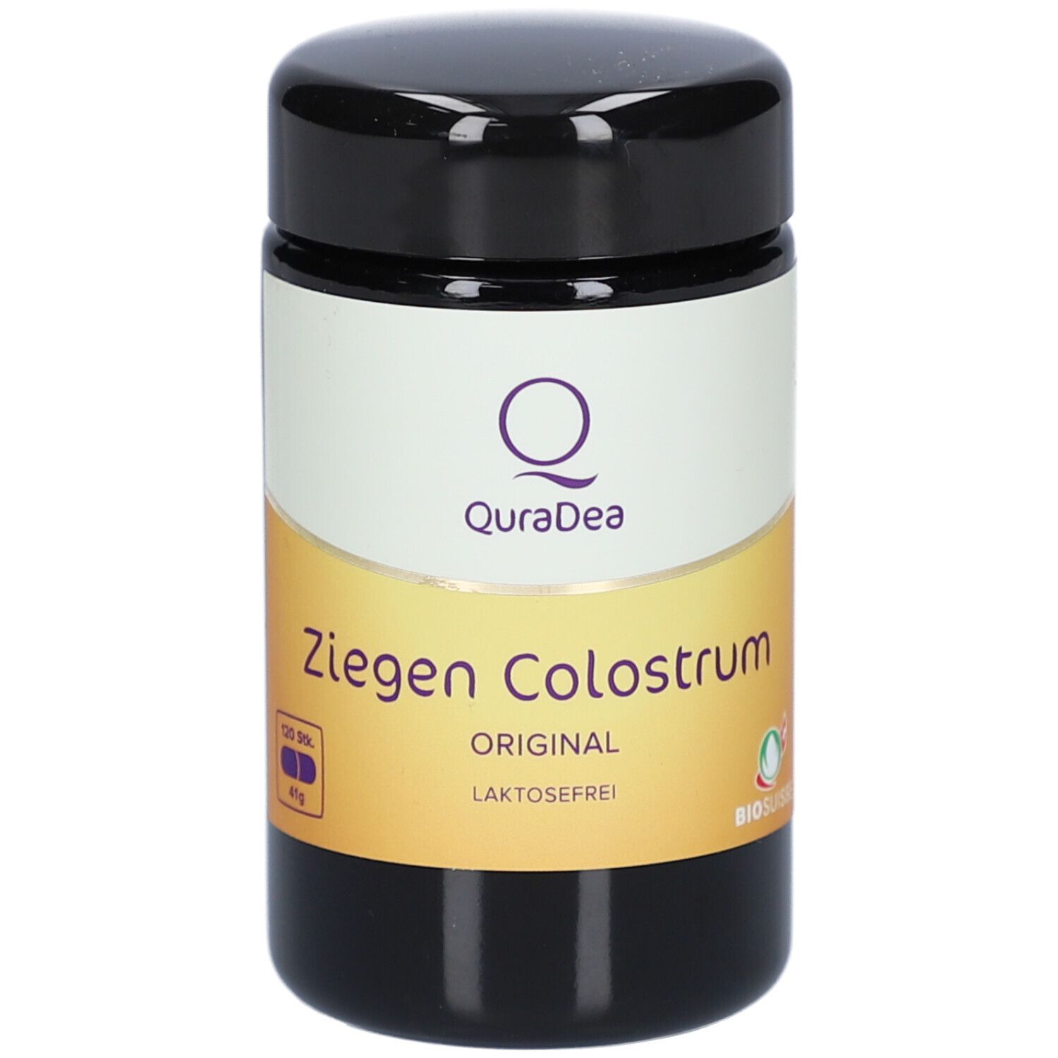 Boîte noire avec étiquette blanche et jaune. Logo QuraDea et texte Ziegen Colostrum Original. Sans lactose.