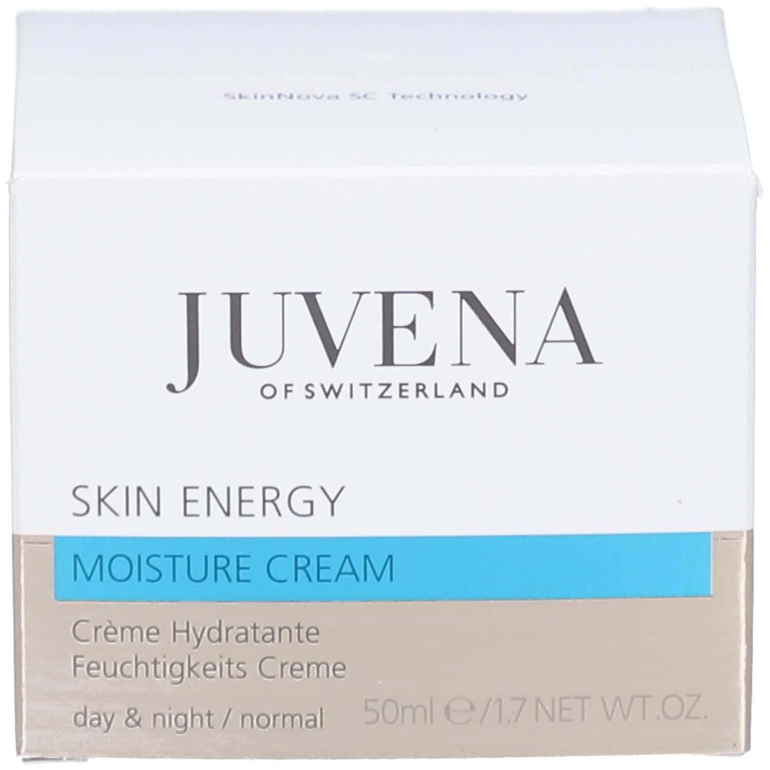Emballage avec "JUVENA OF SWITZERLAND" et "SKIN ENERGY". Couleurs bleu et blanc.