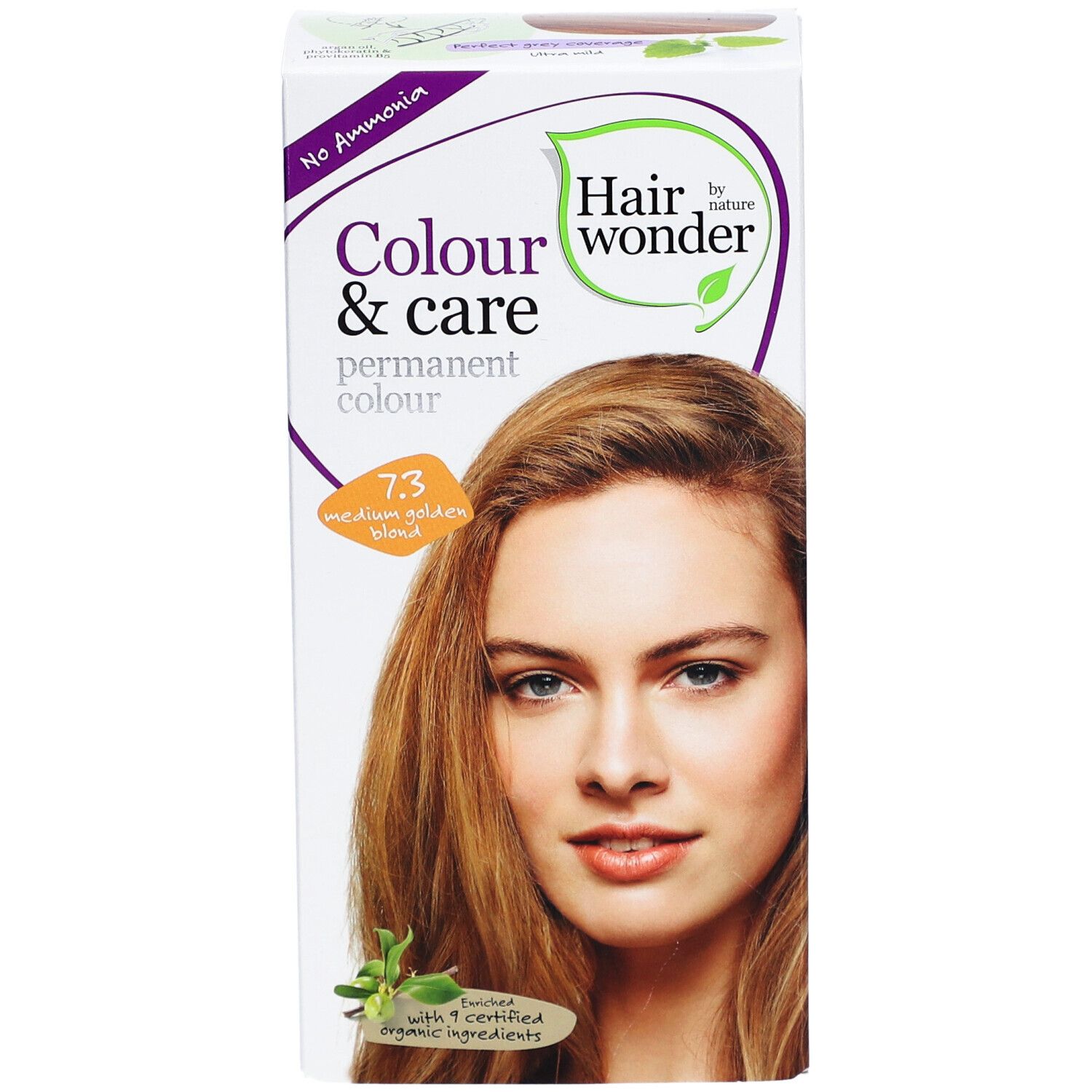 Boîte de coloration capillaire. Inscription : Colour & Care, 7.3 blond doré moyen. Image d'une femme aux cheveux blonds dorés.
