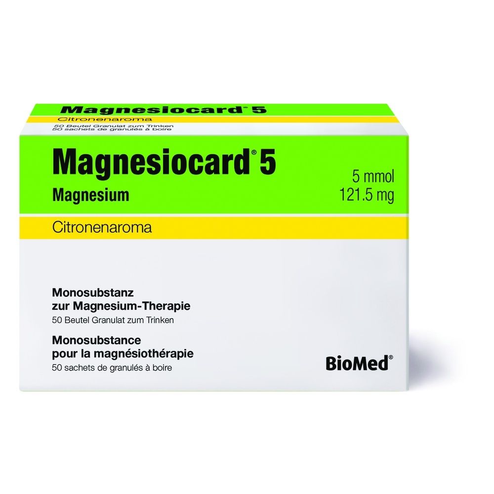 Karton mit Produktinformationen. Aufschrift: Magnesiocard 5, Granulat. Grün-weiße Verpackung. Herstellerlogo.