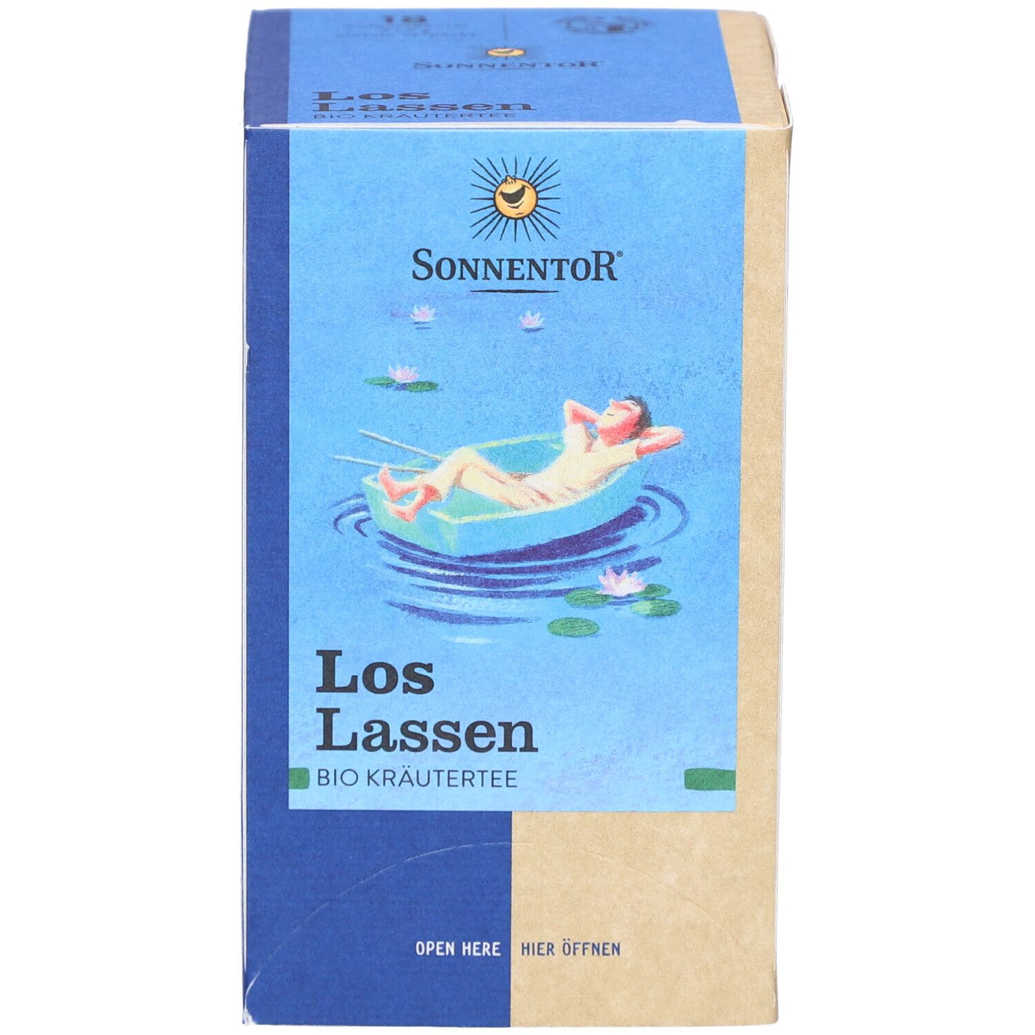 Boîte de thé SONNENTOR Loslassen. Face avant avec logo, nom du produit et illustration d'une personne dans un bateau.