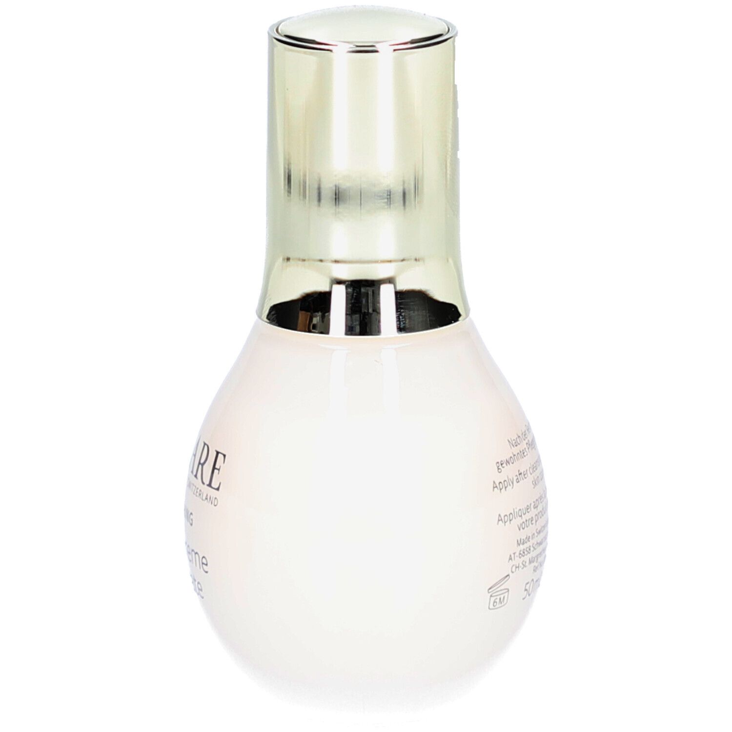 Flacon beige à bouchon doré. Dos avec texte. DECLARÉ, PRO YOUTH, Youth Supreme Concentrate.