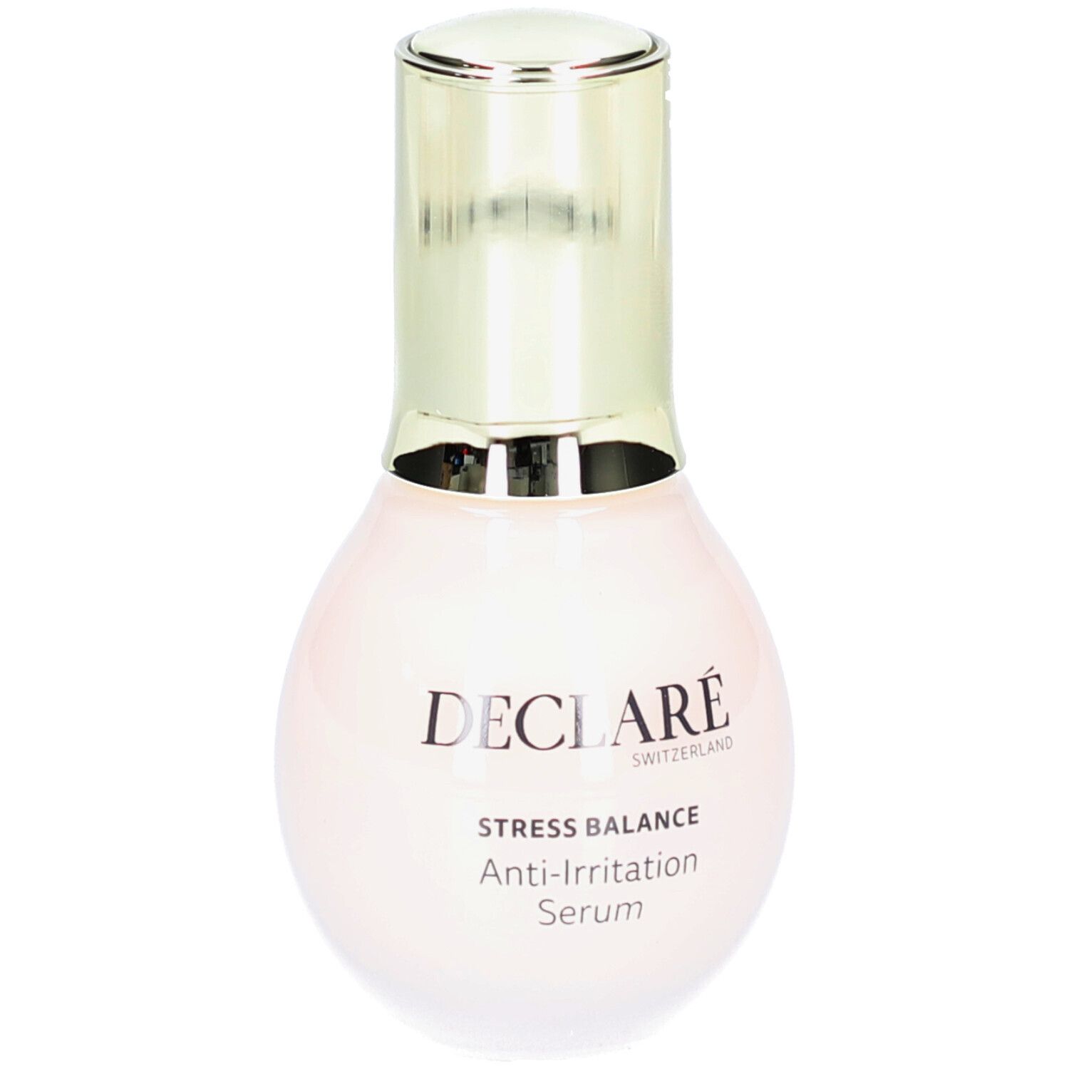 Serumflasche mit goldenem Deckel und Verpackung. DECLARÉ Stress Balance Anti-Irritation Serum.