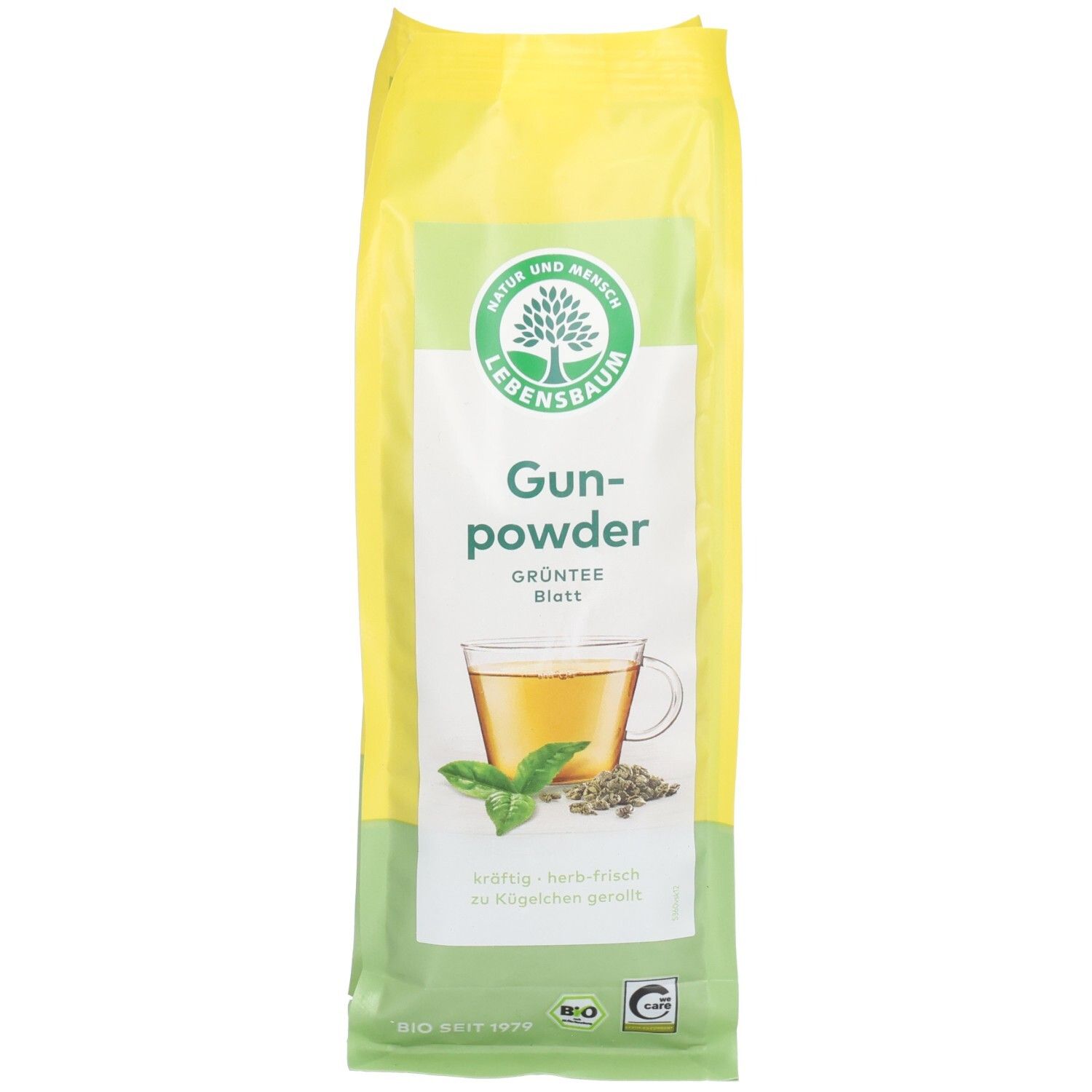 Gelb-grüne Verpackung. LEBENSBAUM-Logo. Grüntee Gunpowder. Abbildung: Tasse Tee, Blätter. Bio-Siegel.