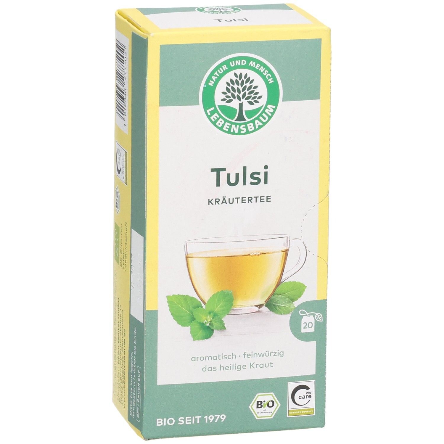 LEBENSBAUM Tulsi Kräutertee-Verpackung. Grün-weißes Karton mit Logo, Produktname, Teetasse-Illustration und 20 Teebeuteln.