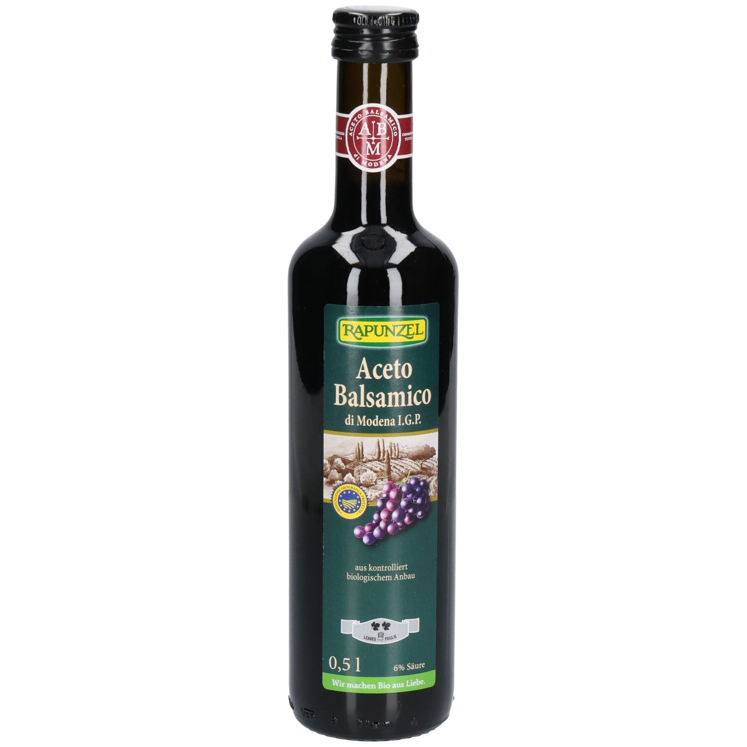 Bouteille en verre foncé avec étiquette. Inscription: RAPUNZEL Aceto Balsamico di Modena IGP. 0,5 l. Avec sceau.