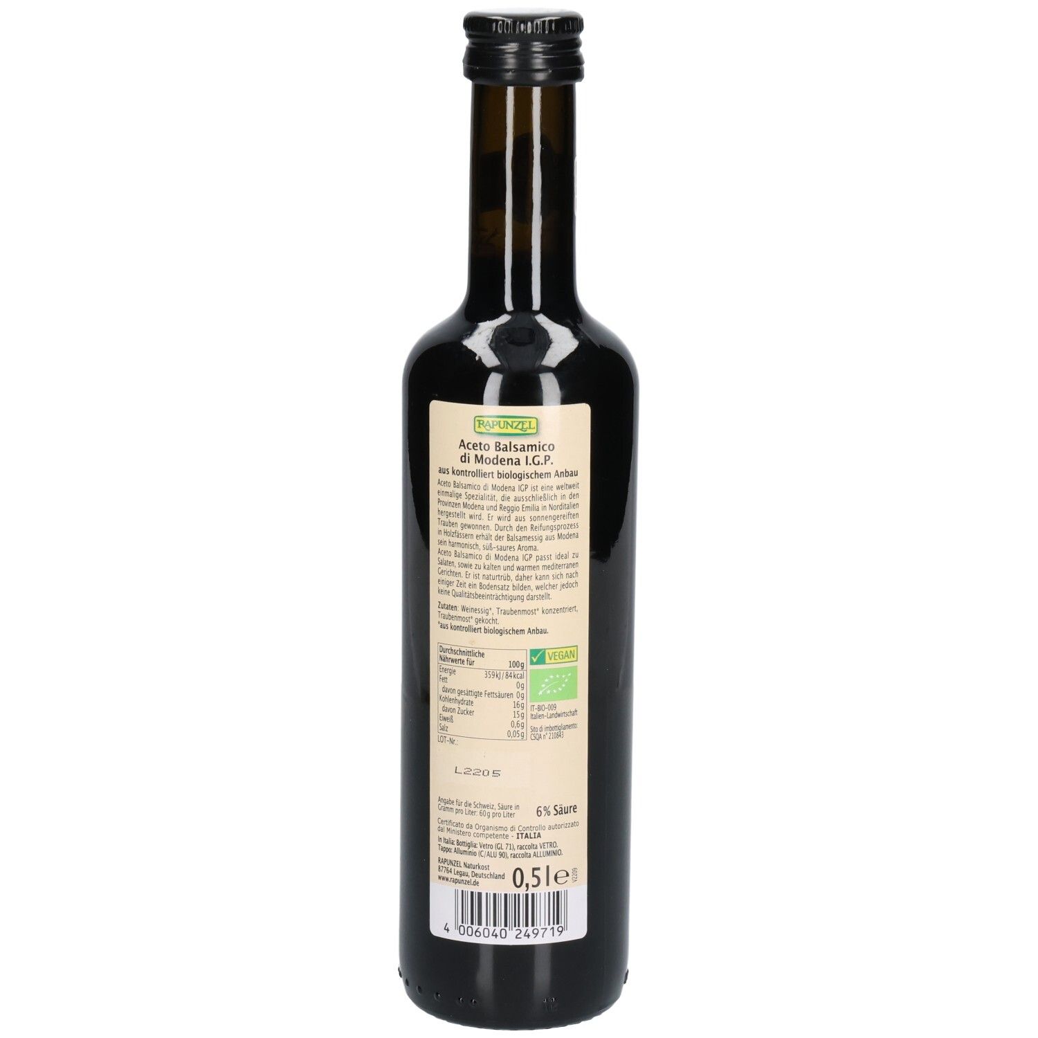 Dos de la bouteille en verre foncé. Étiquette avec texte et informations. Bouchon noir. 0,5 l.