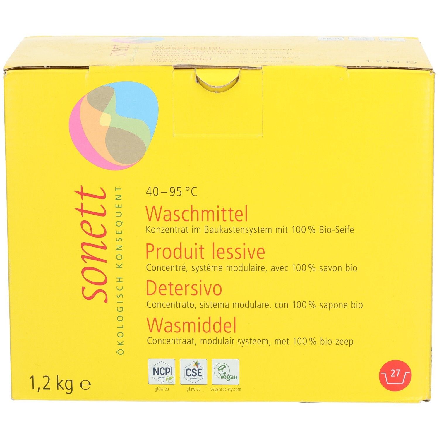Emballage en carton jaune. Inscription : sonett, lessive, 1,2 kg. Logo avec cercles colorés. Texte en allemand, français, italien et néerlandais.