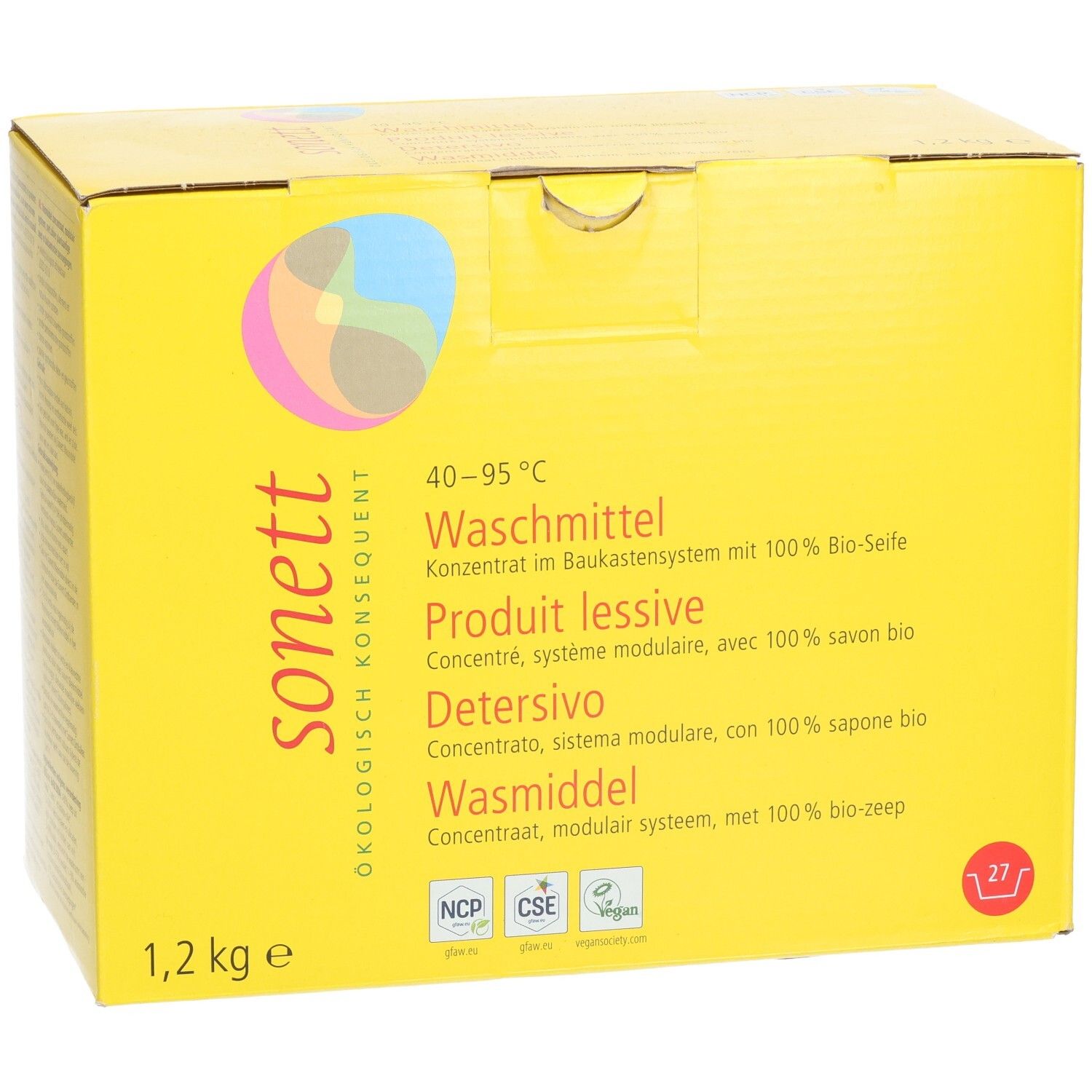 Emballage en carton jaune. Inscription : sonett, lessive, 1,2 kg. Logo avec cercles colorés. Texte en allemand, français, italien et néerlandais.