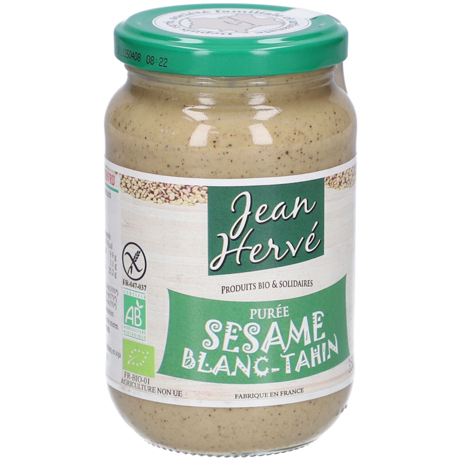 Pot de purée de sésame Jean Hervé. Étiquette verte et blanche. Inscription "Sesame Blanc-Tahini". Couvercle vert.