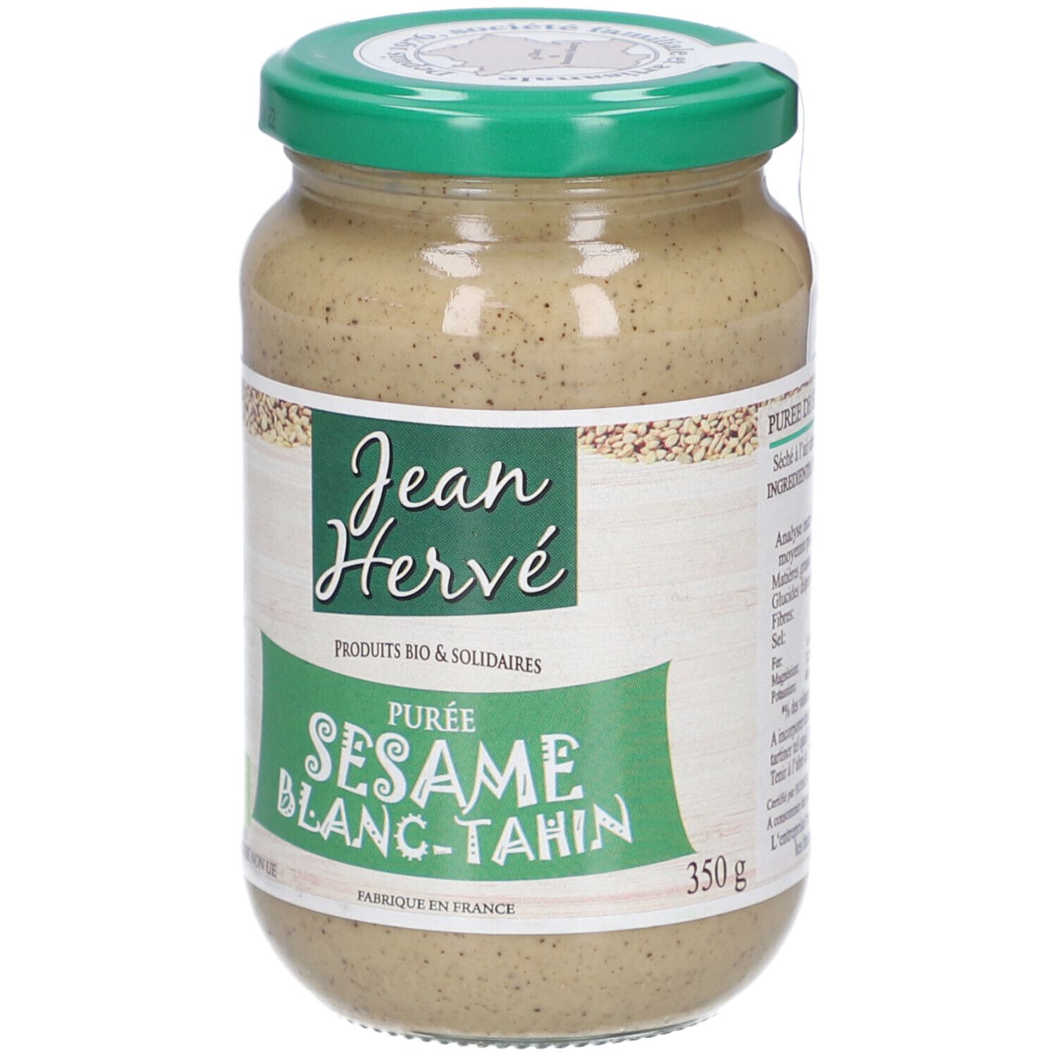 Pot de purée de sésame Jean Hervé. Étiquette verte et blanche. Inscription "Sesame Blanc-Tahini". Couvercle vert.