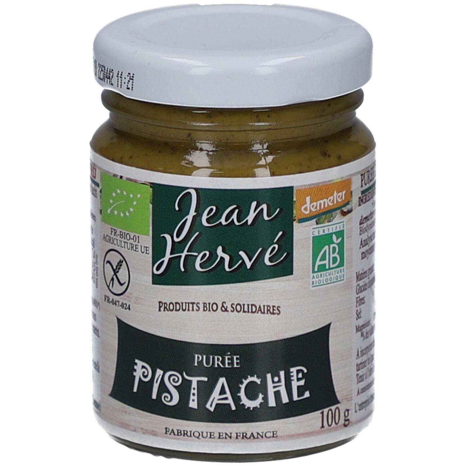 Pot de purée de pistaches, couvercle blanc. Étiquette "Jean Hervé", "Purée Pistache", label bio, et 100g.