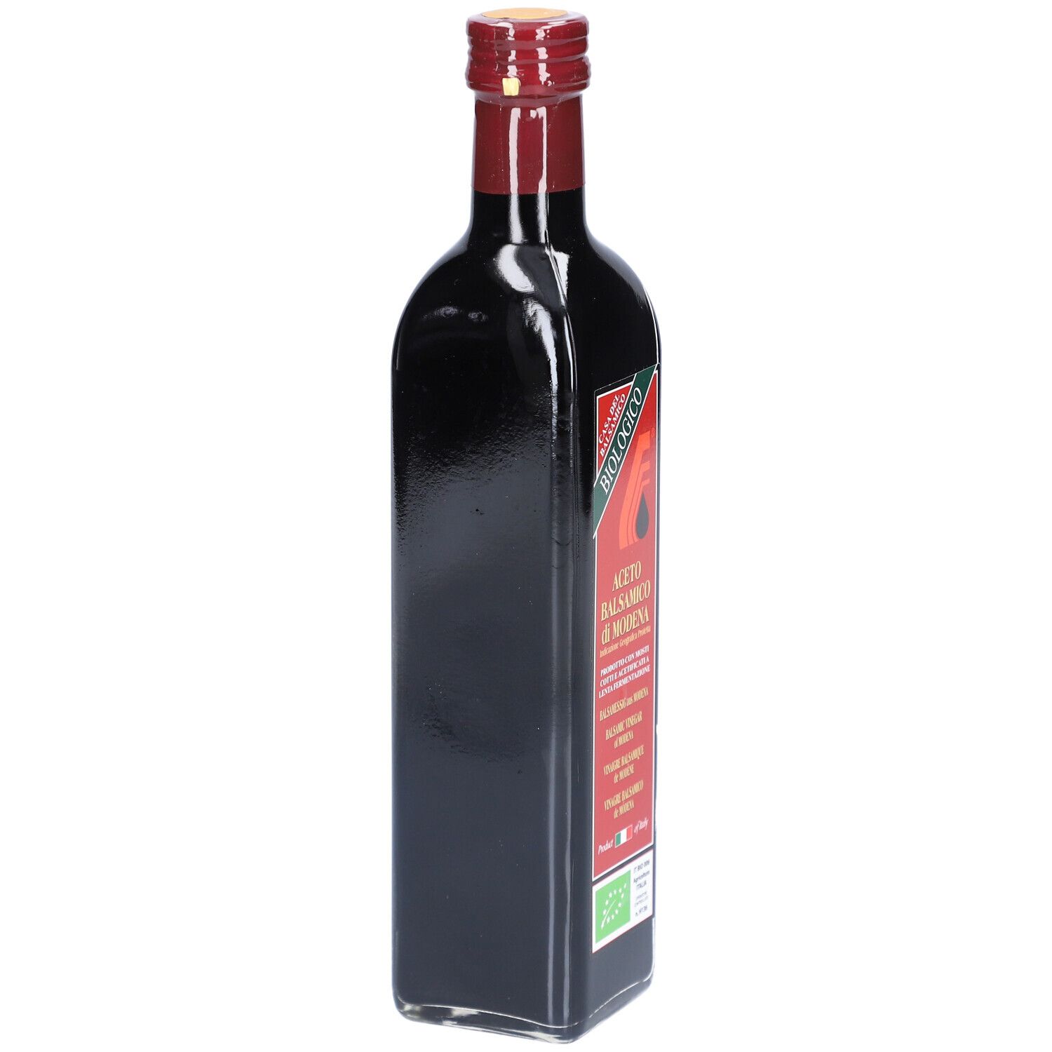 Dunkle Glasflasche mit rotem Verschluss. Etikett mit Text: Aceto Balsamico di Modena. Bio-Zertifizierung.
