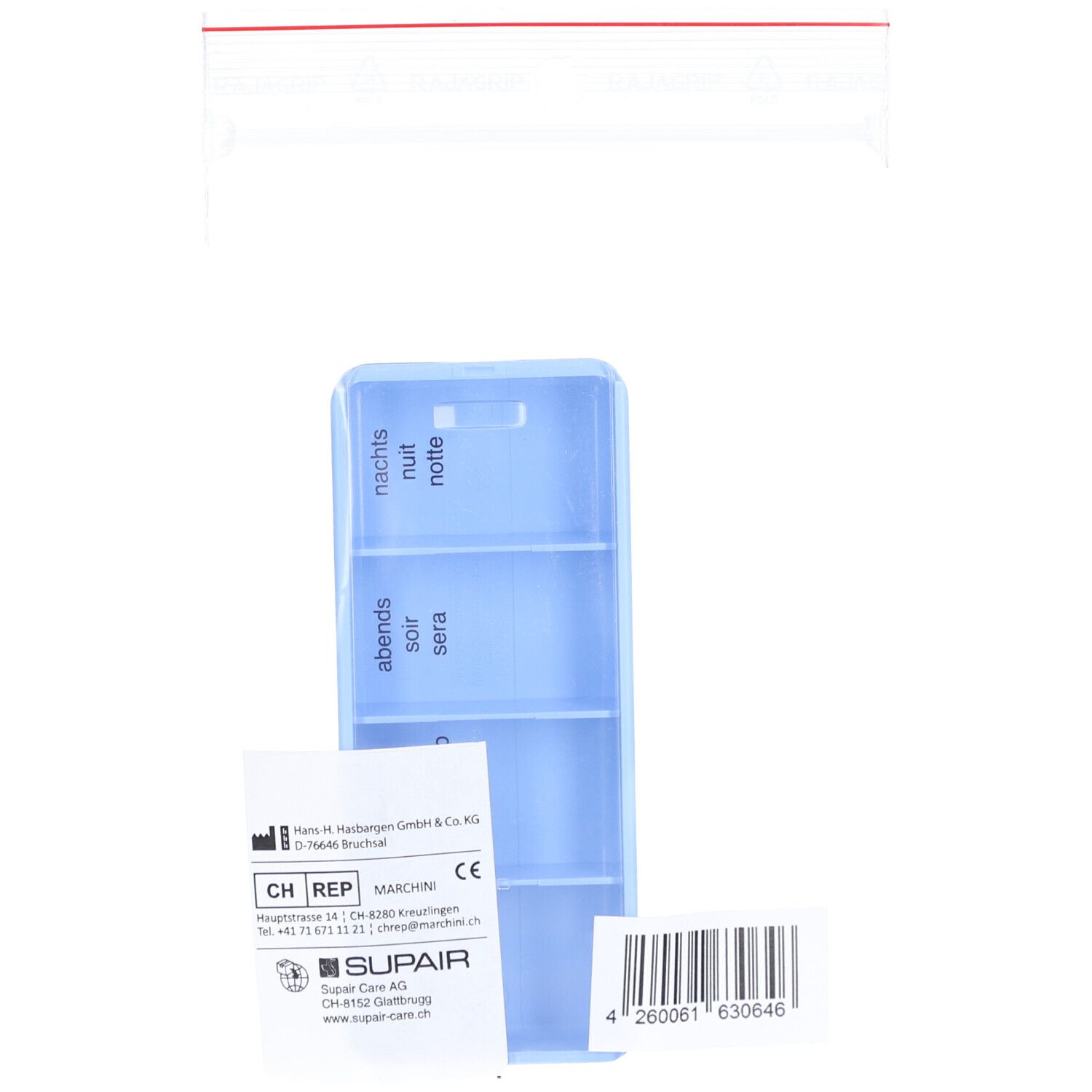 Pilulier bleu à 4 compartiments, étiqueté avec « soir », « nuit ». Un sachet et une étiquette avec code-barres et texte.