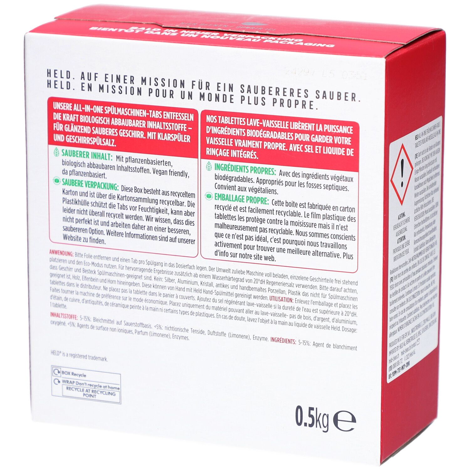 Rückseite der Kartonbox. Text in mehreren Sprachen. Warnhinweis-Symbol und Gewicht "0.5kg" sind sichtbar.