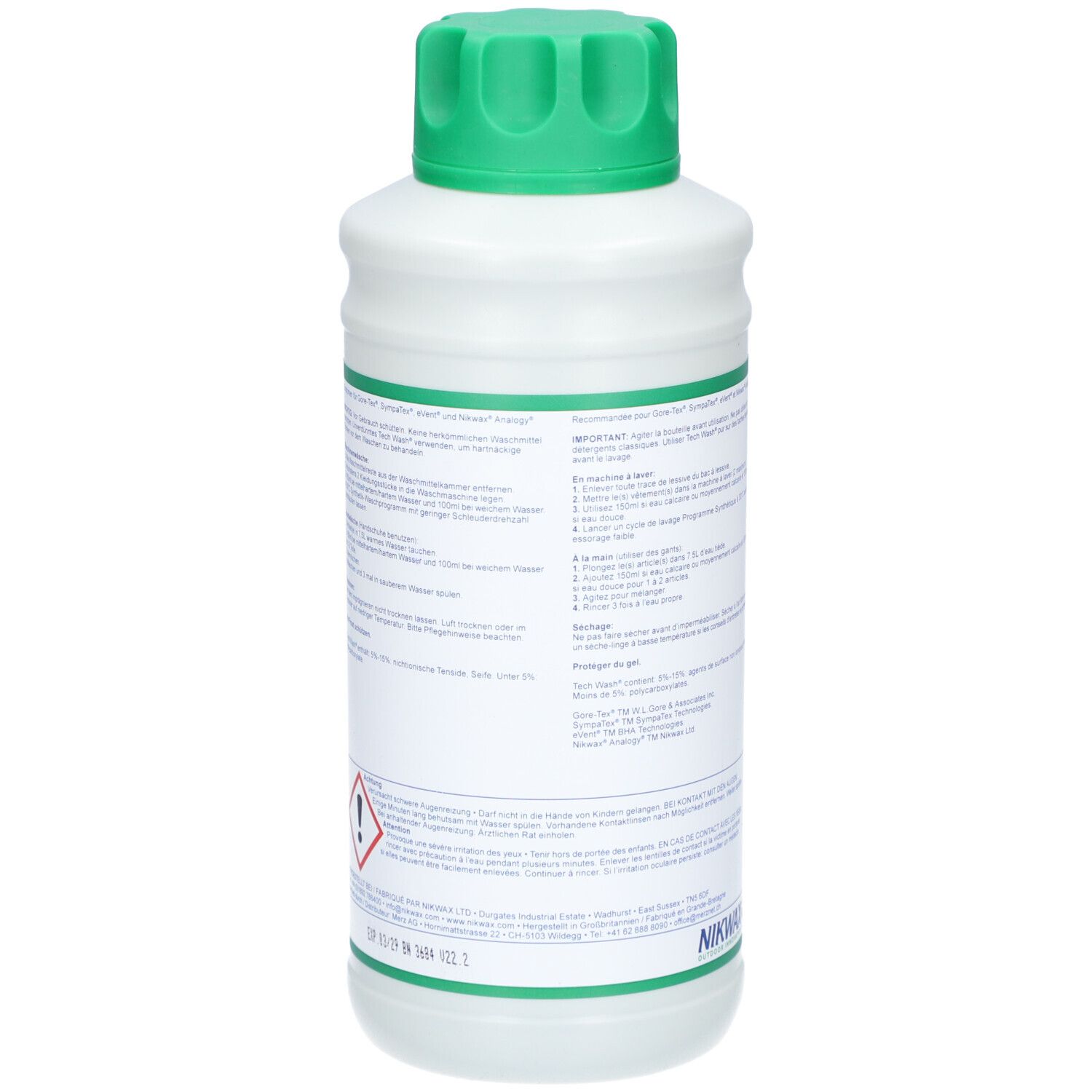 Rückseite der Flasche. Text in mehreren Sprachen. NIKWAX Logo. Grün-weiße Farbgebung. Gefahrensymbol. Produktinformationen.
