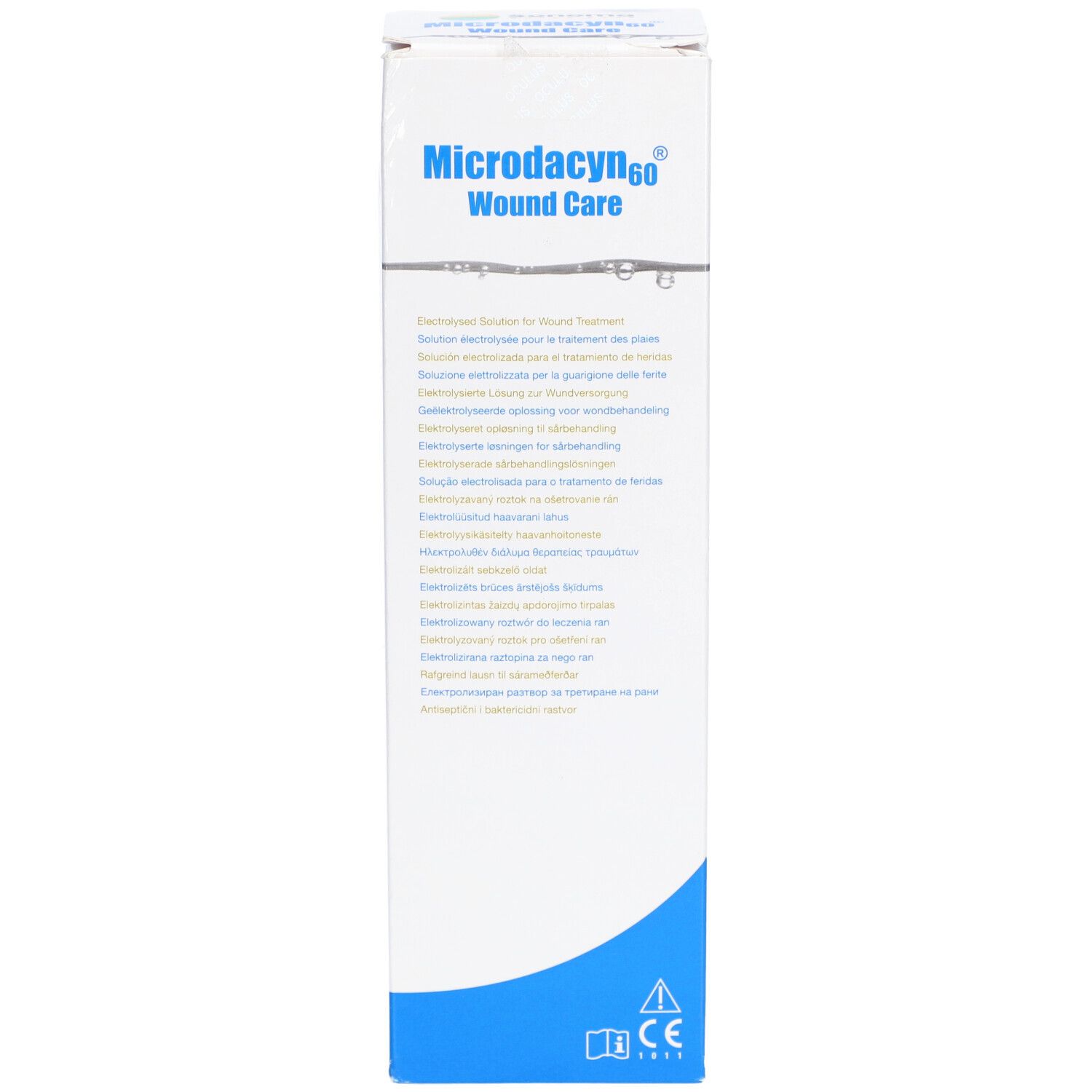 Boîte Microdacyn60 Wound Care. Blanche avec base bleue. Texte multilingue. Contient des informations et des symboles.