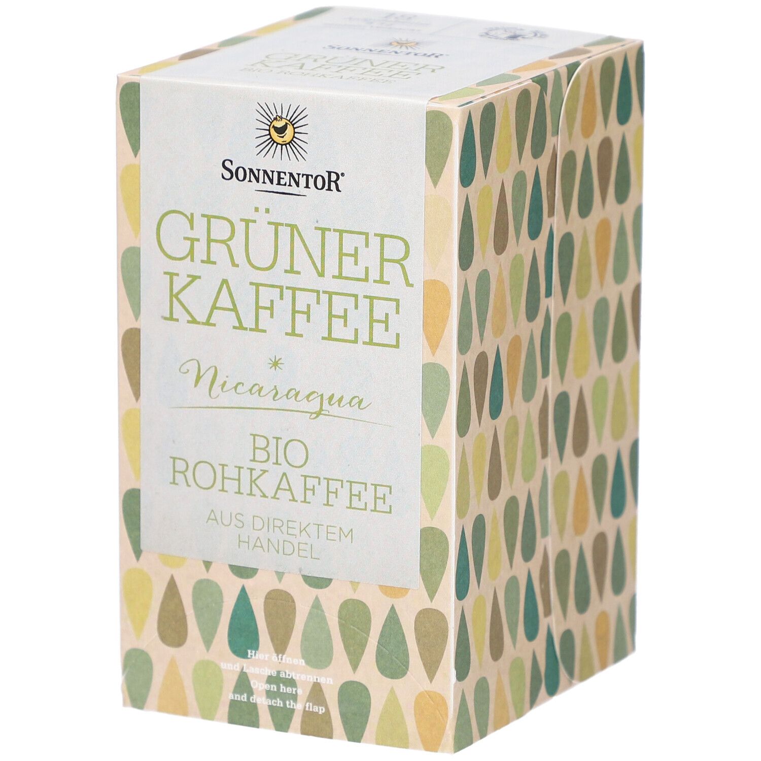 Karton mit Sonnentor Grüner Kaffee. Aufschrift: Bio Rohkaffee, Nicaragua. Verpackung mit Tropfenmuster in Grün- und Beigetönen.