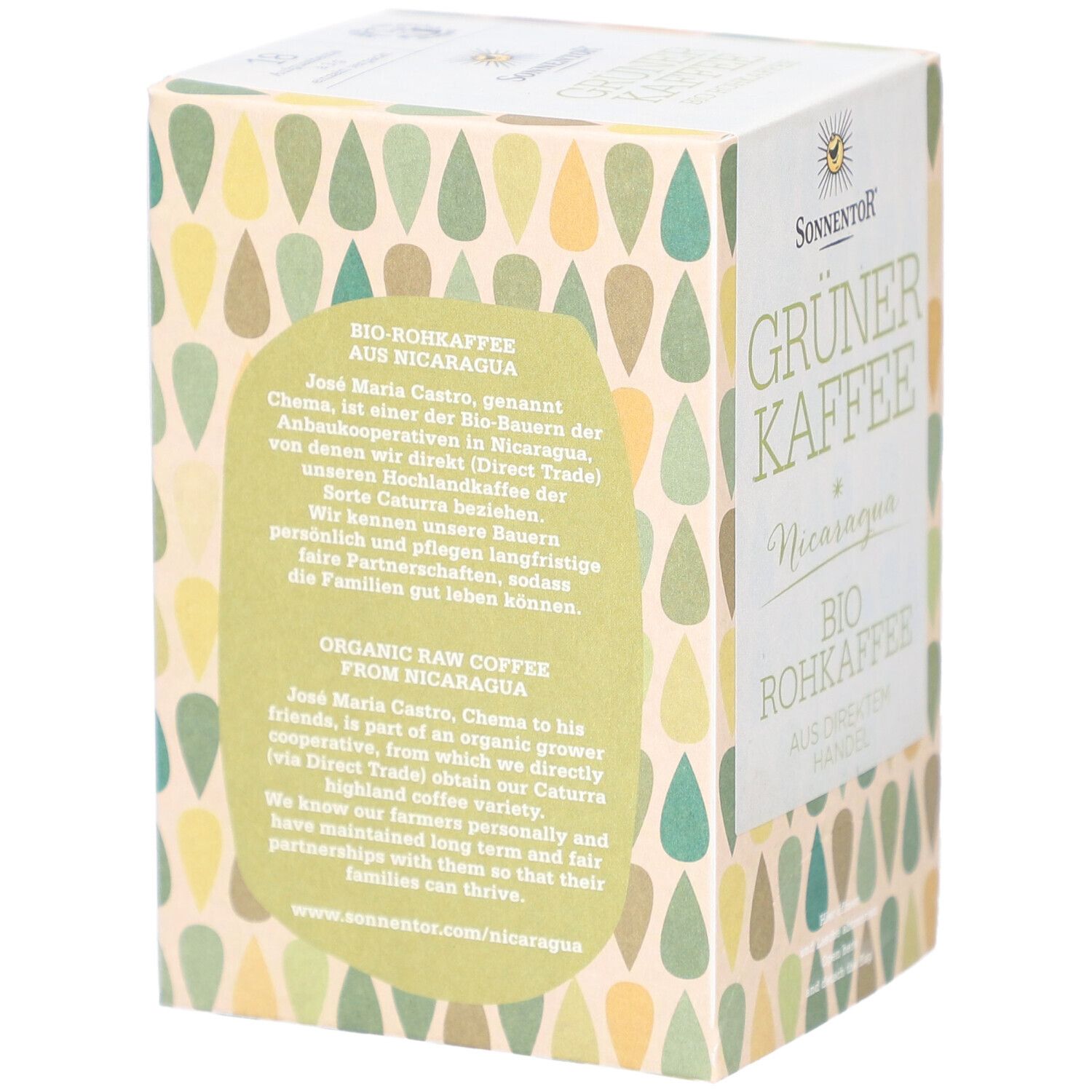 Rückseite der Sonnentor Grüner Kaffee Verpackung. Text über Bio-Rohkaffee aus Nicaragua. Tropfenmuster in Grün- und Beigetönen.