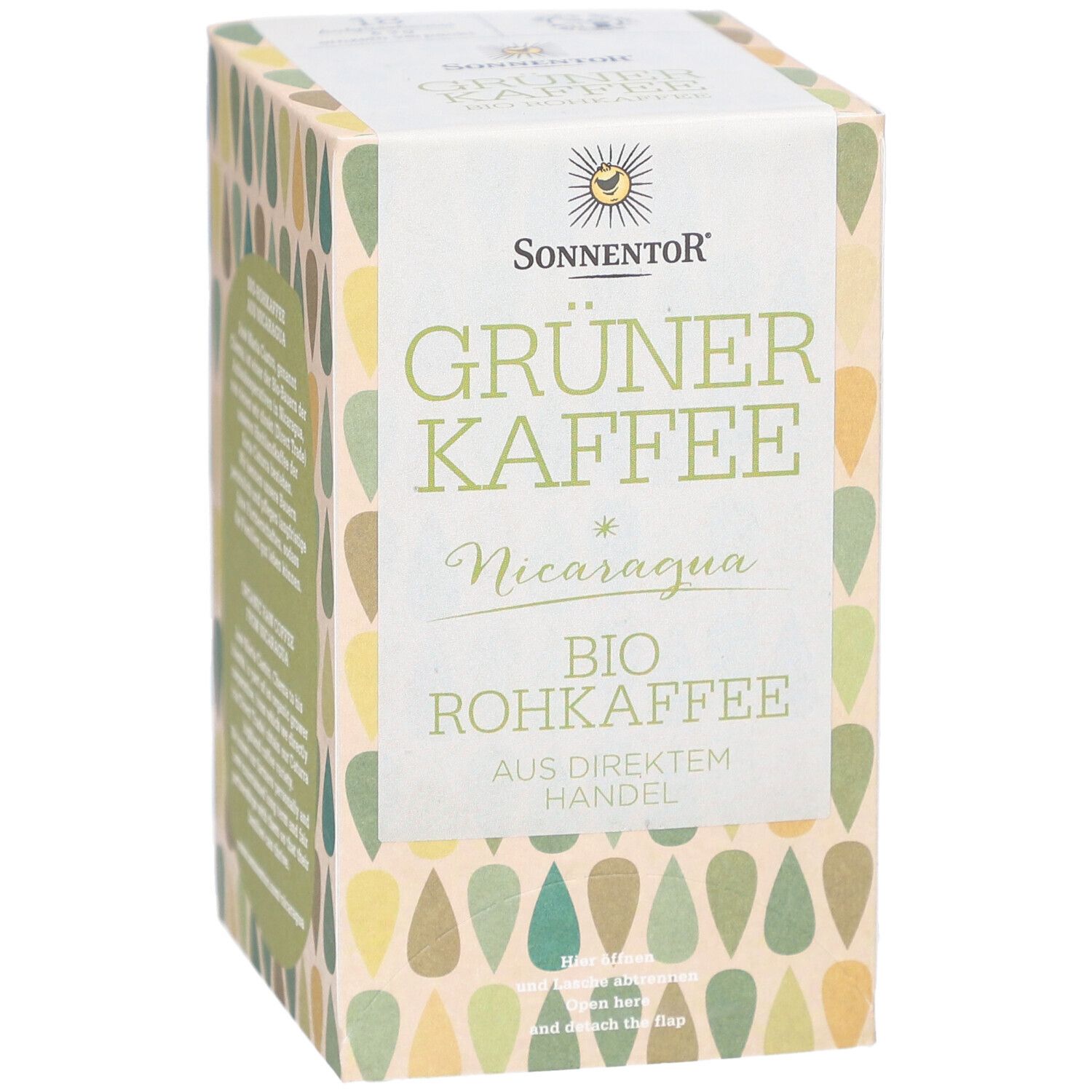 Sonnentor Grüner Kaffee Verpackung. Aufschrift: Grüner Kaffee, Nicaragua, Bio Rohkaffee. Tropfenmuster in Grün- und Beigetönen.