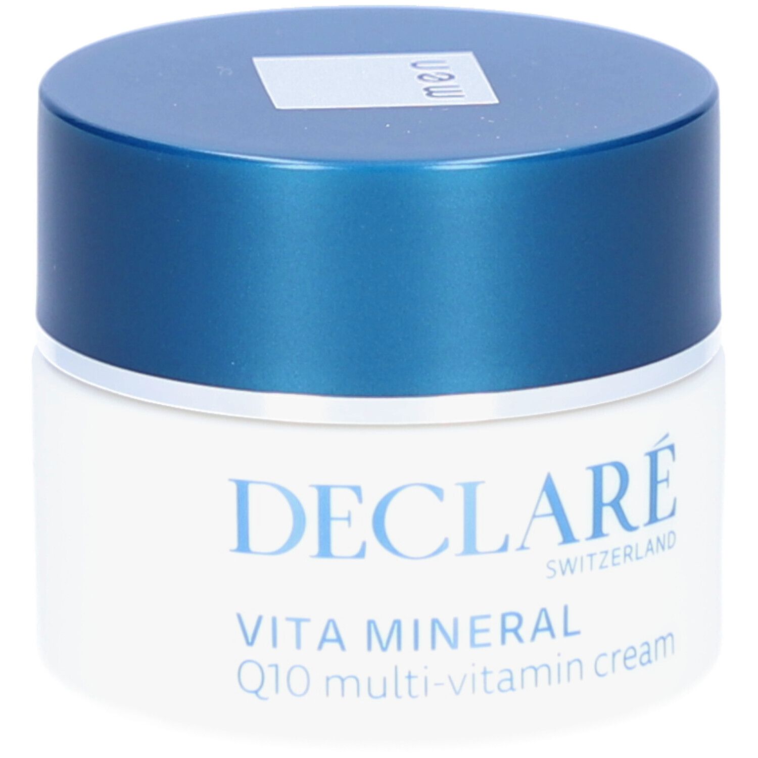Pot de crème à couvercle bleu. Inscription : DECLARÉ, Vita Mineral Q10 multi-vitamin cream.