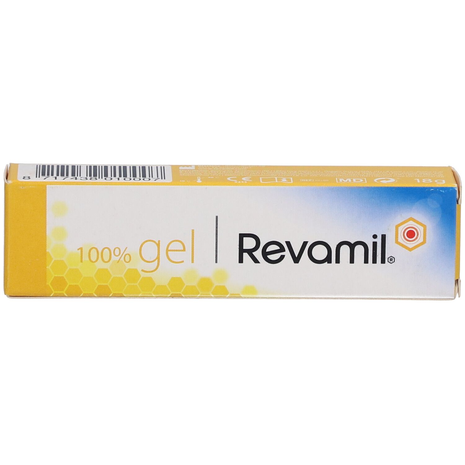 Schachtel. Aufschrift: 100% gel | Revamil. Gelbe Bienenwabenmusterung.