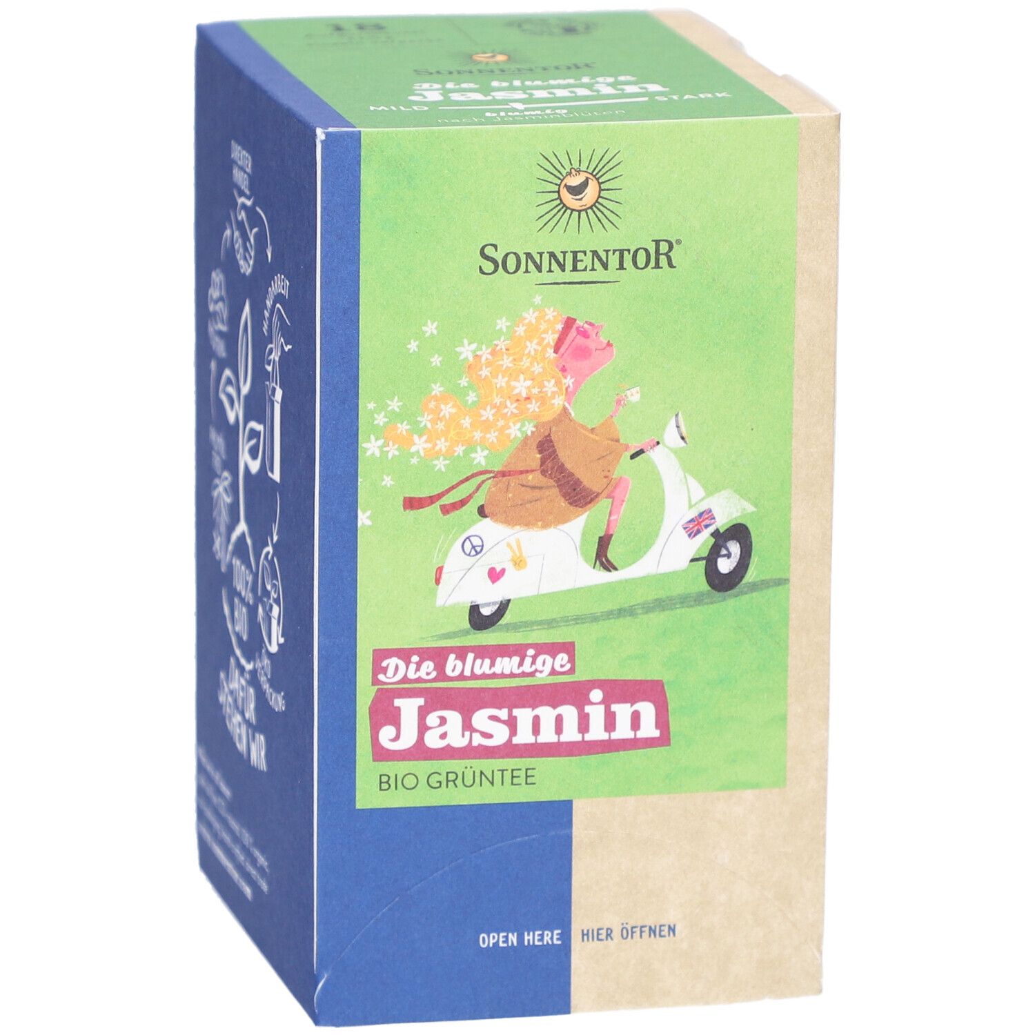 Karton mit Produktabbildung. Aufdruck: "Die blumige Jasmin BIO GRÜNTEE". Logo: SONNENTOR. Illustration: Frau auf Roller.