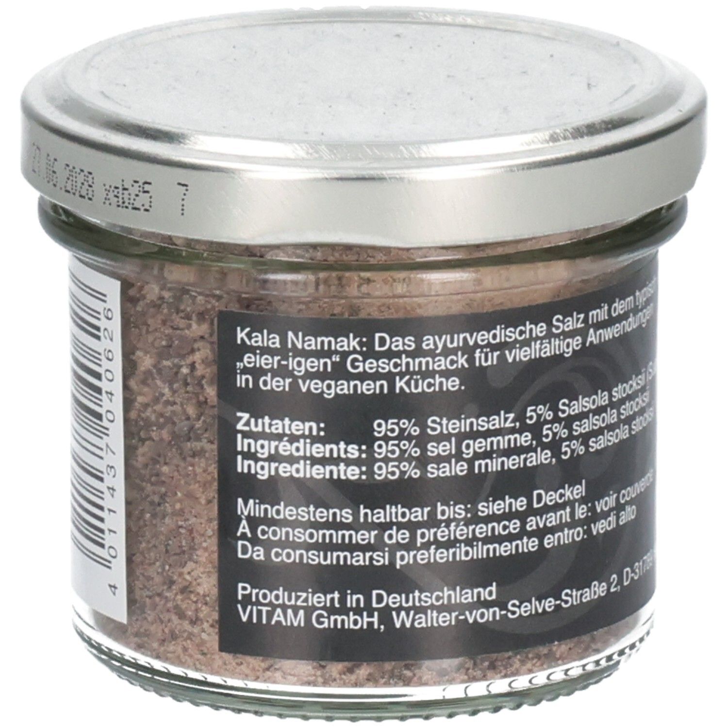 Pot en verre avec étiquette noire. Texte en allemand, liste des ingrédients. Couvercle argenté. Sel visible.