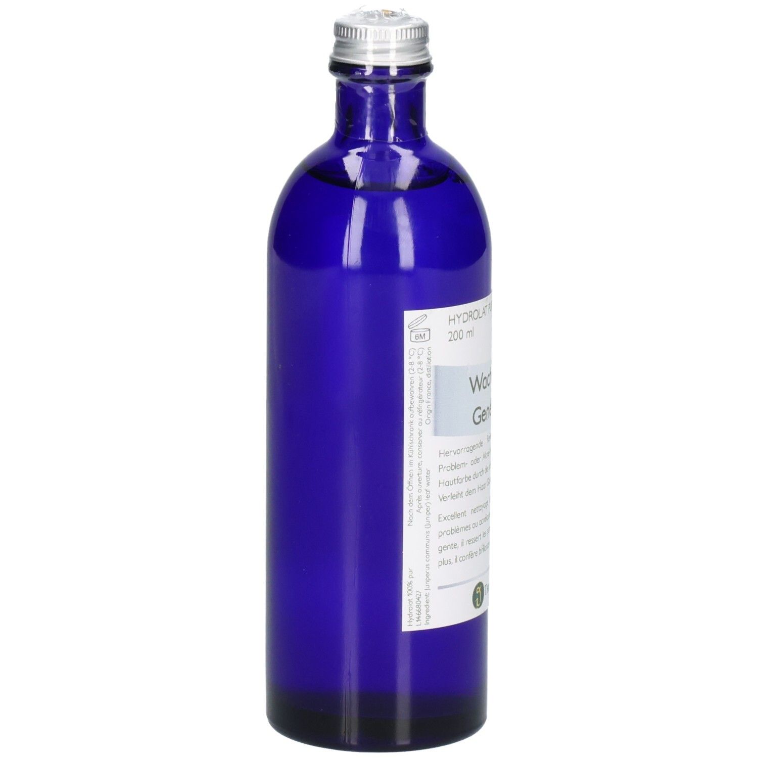 Vue arrière d'une bouteille en verre bleu avec bouchon argenté et étiquette.