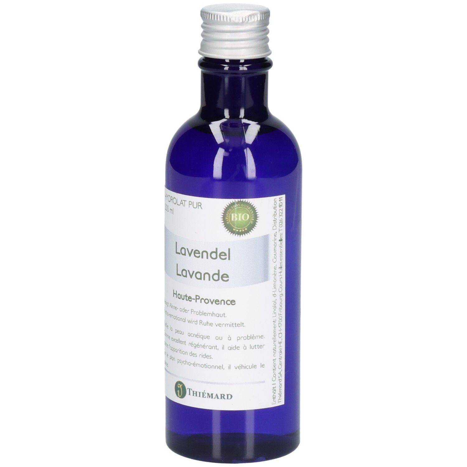 Blaue Glasflasche mit silbernem Verschluss, gefüllt mit Lavendelwasser. Bio-Siegel und "Lavendel Lavande" Aufschrift.