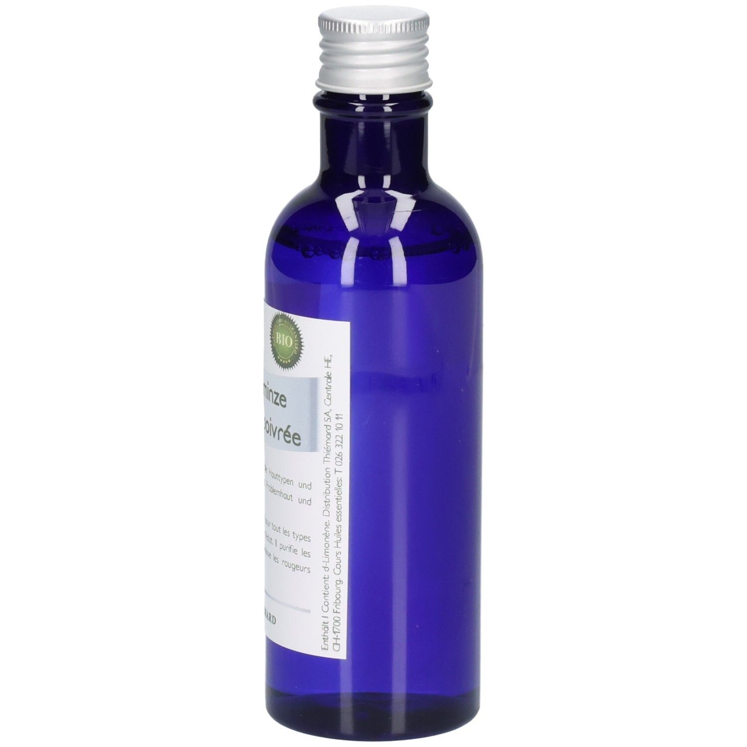 Blaue Glasflasche mit silbernem Schraubverschluss, Etikett mit Bio-Siegel und Produktinformationen.