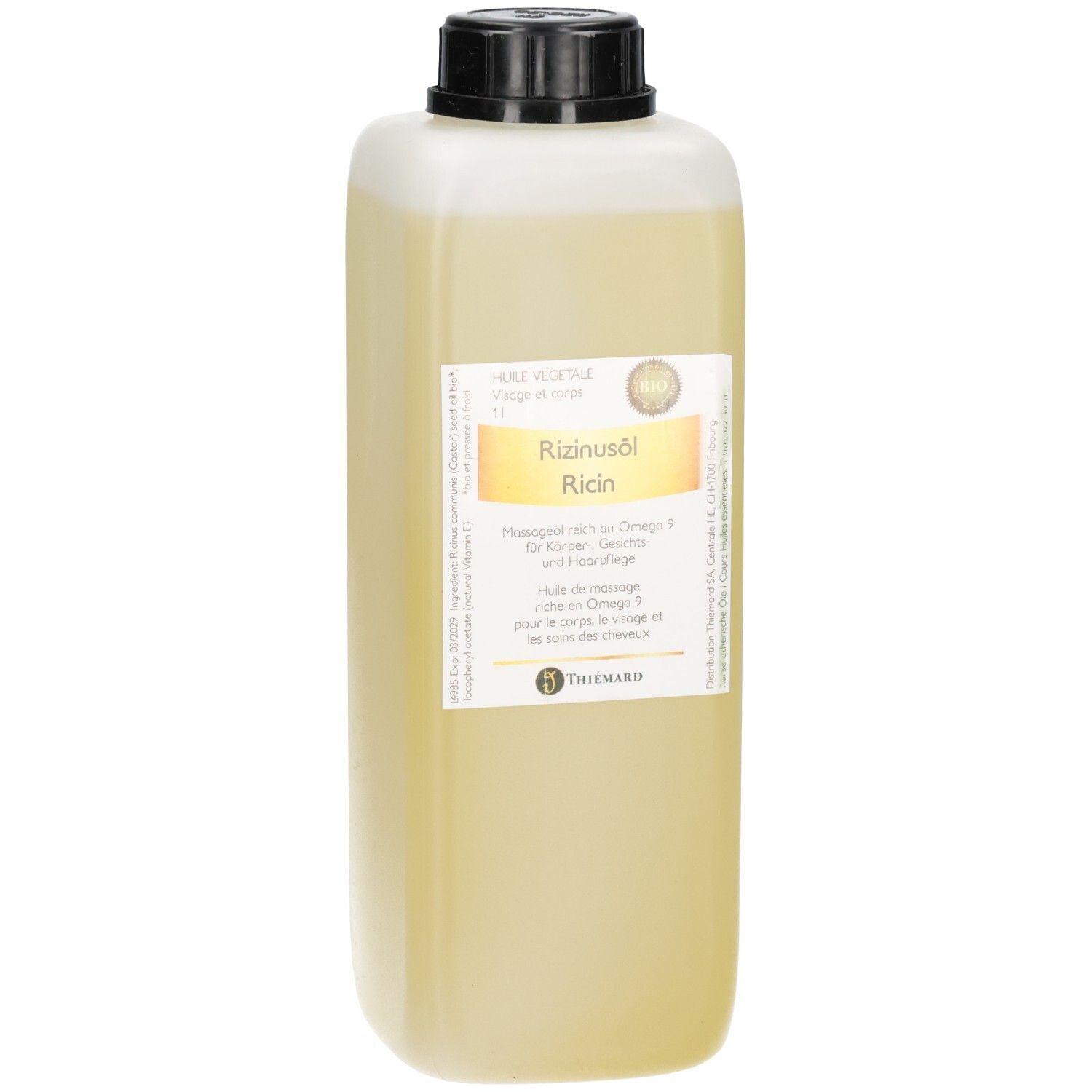 Flasche mit Rizinusöl, gelbe Flüssigkeit, schwarzer Deckel, Etikett mit Produktinformationen.