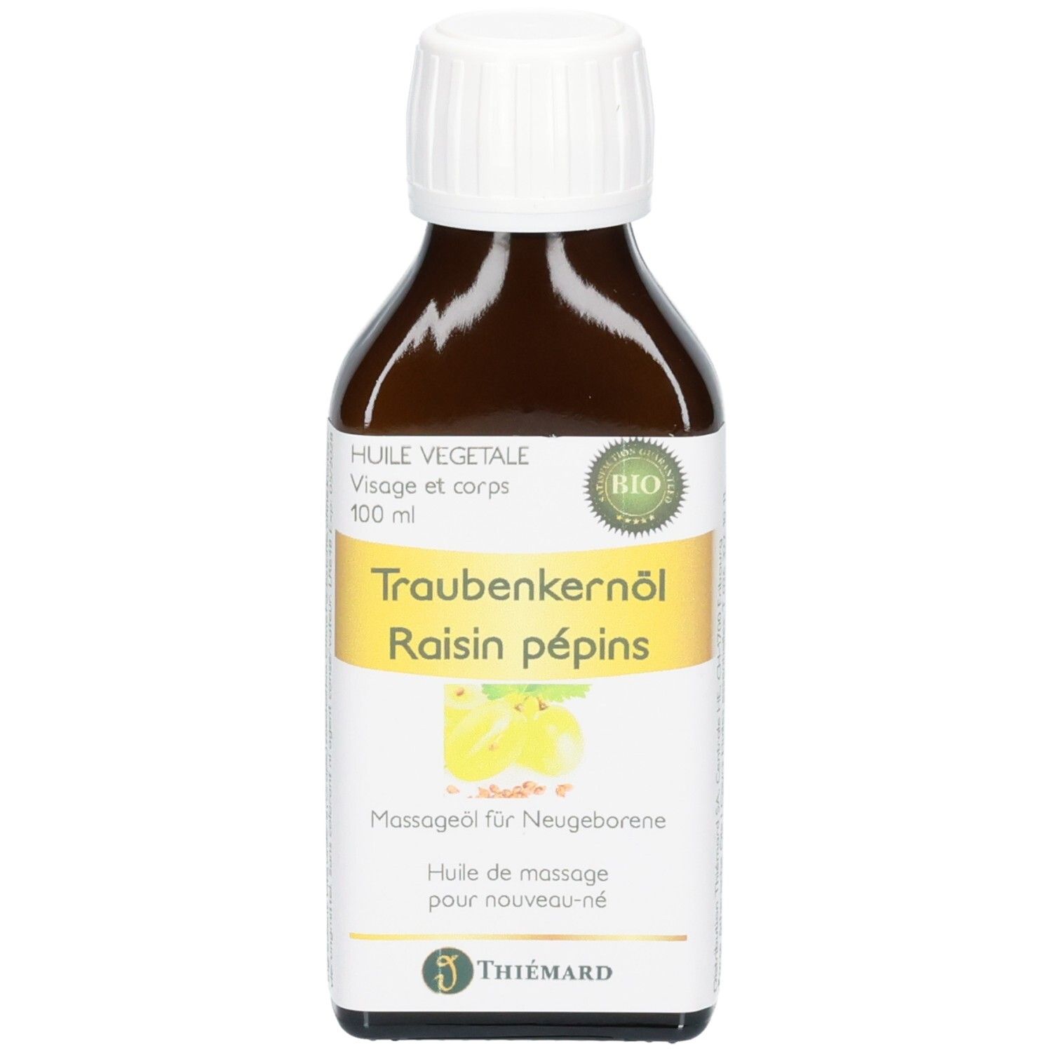 Braune Glasflasche mit weißem Schraubverschluss, gefüllt mit Traubenkernöl. Label zeigt "Traubenkernöl Raisin pépins" und "BIO".