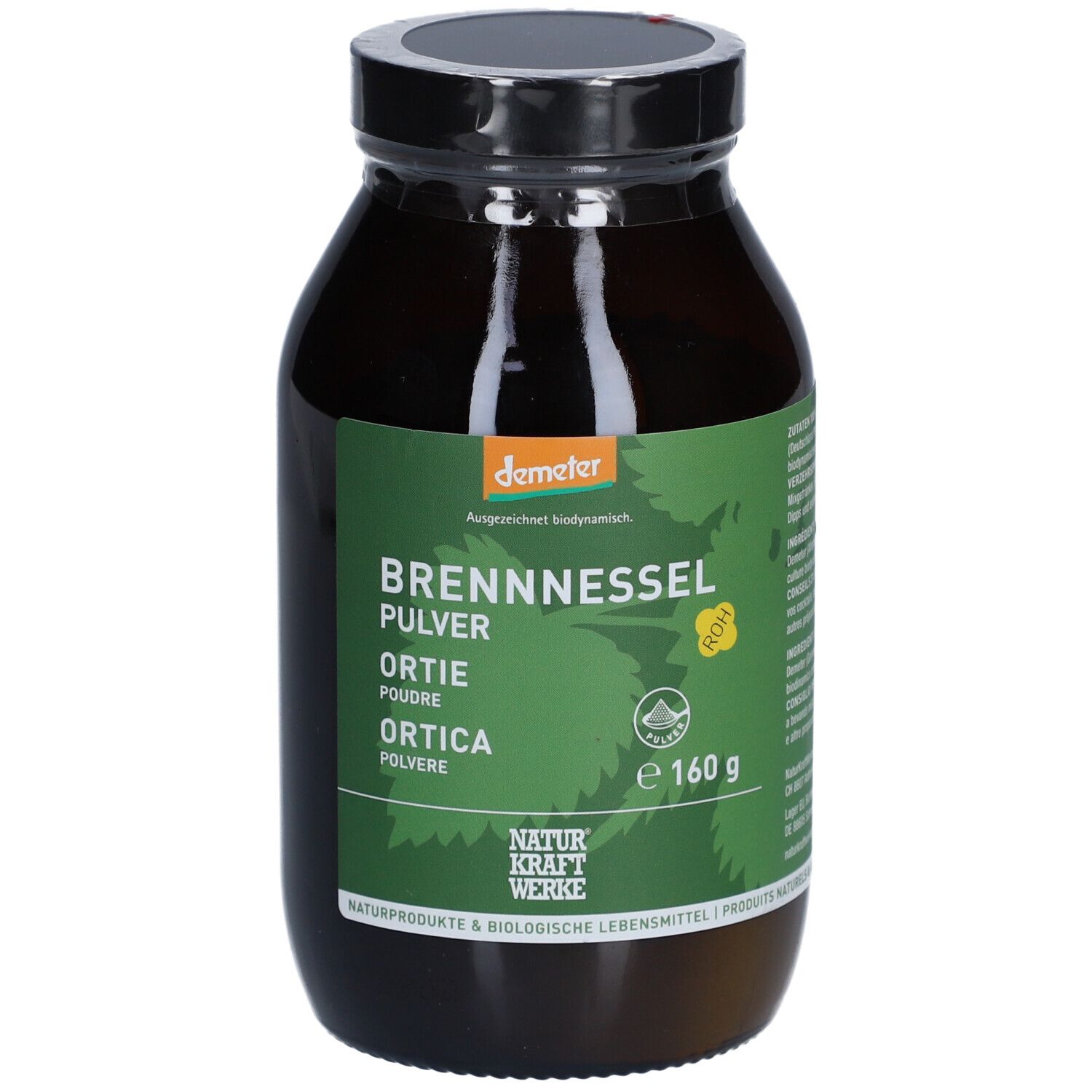 Braune Glasflasche mit schwarzem Deckel. Etikett mit Produktnamen, Demeter-Logo und 160g. NATURKRAFTWERKE Ortie Poudre Demeter.