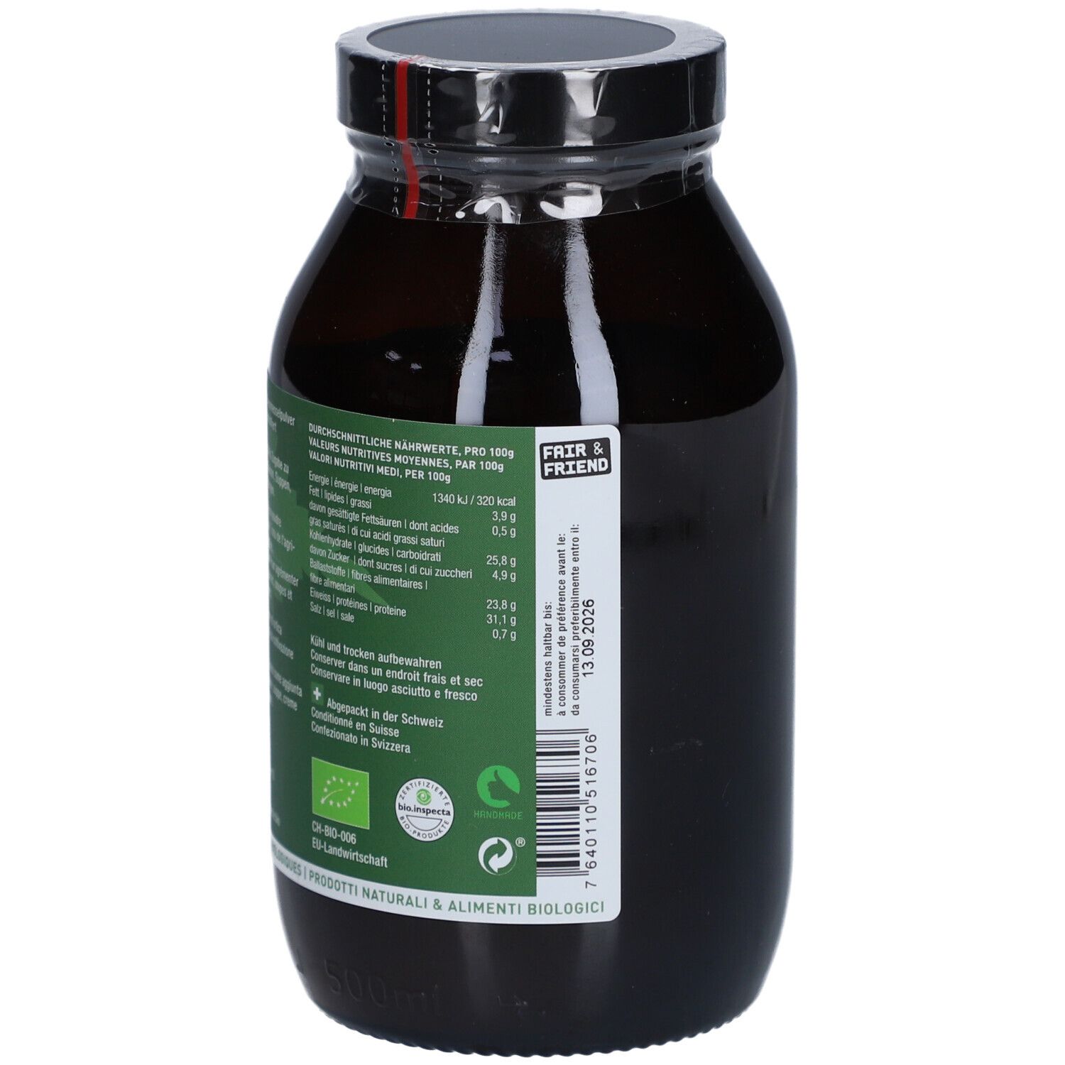 Braune Glasflasche mit schwarzem Deckel. Etikett mit Nährwertangaben und Haltbarkeitsdatum. NATURKRAFTWERKE Ortie Poudre Demeter.