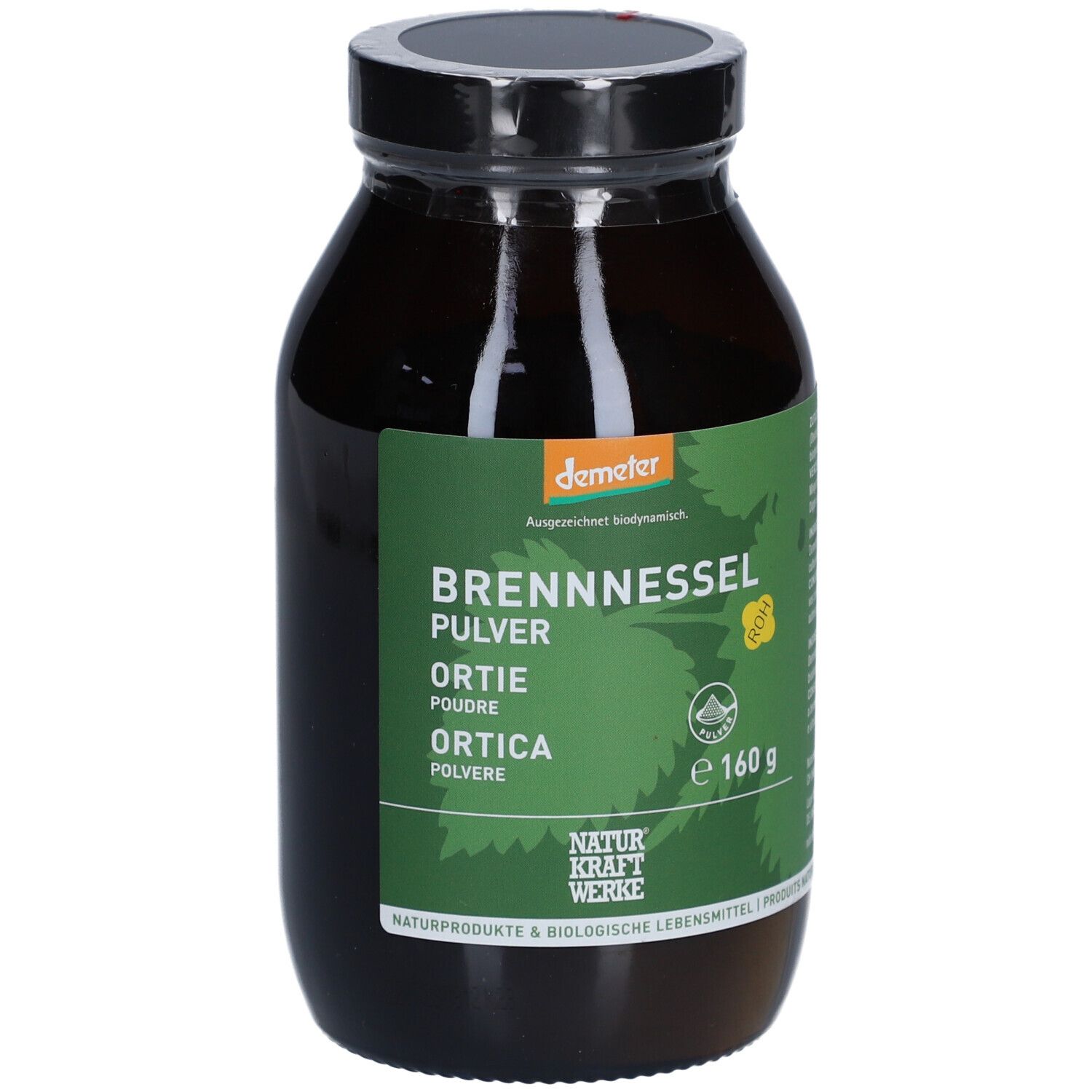 Braune Glasflasche mit schwarzem Deckel. Etikett mit Produktnamen, Demeter-Logo und 160g. NATURKRAFTWERKE Ortie Poudre Demeter.