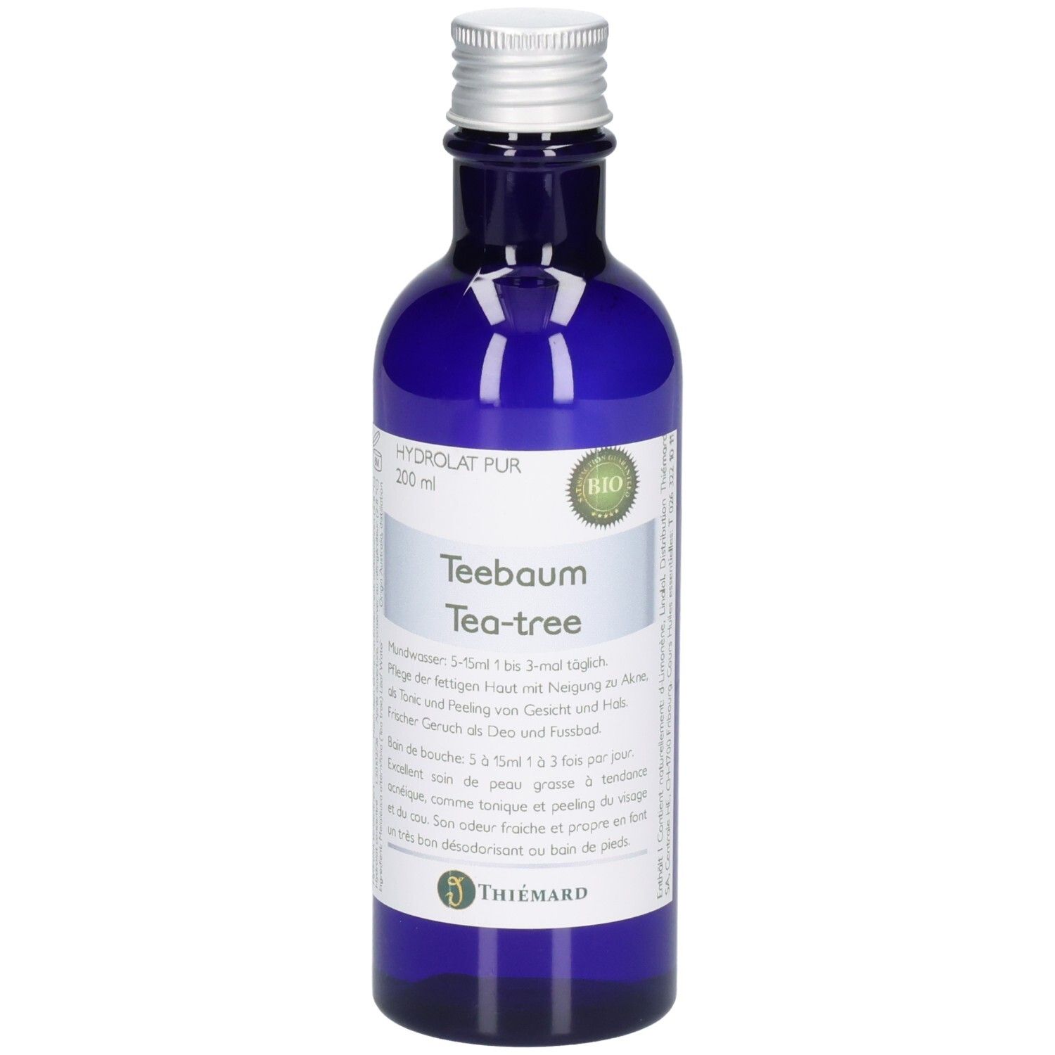 Blaue Glasflasche mit silbernem Verschluss, enthält 200ml Teebaum Hydrolat Pur. Bio-Siegel und Thiemann-Logo sichtbar.