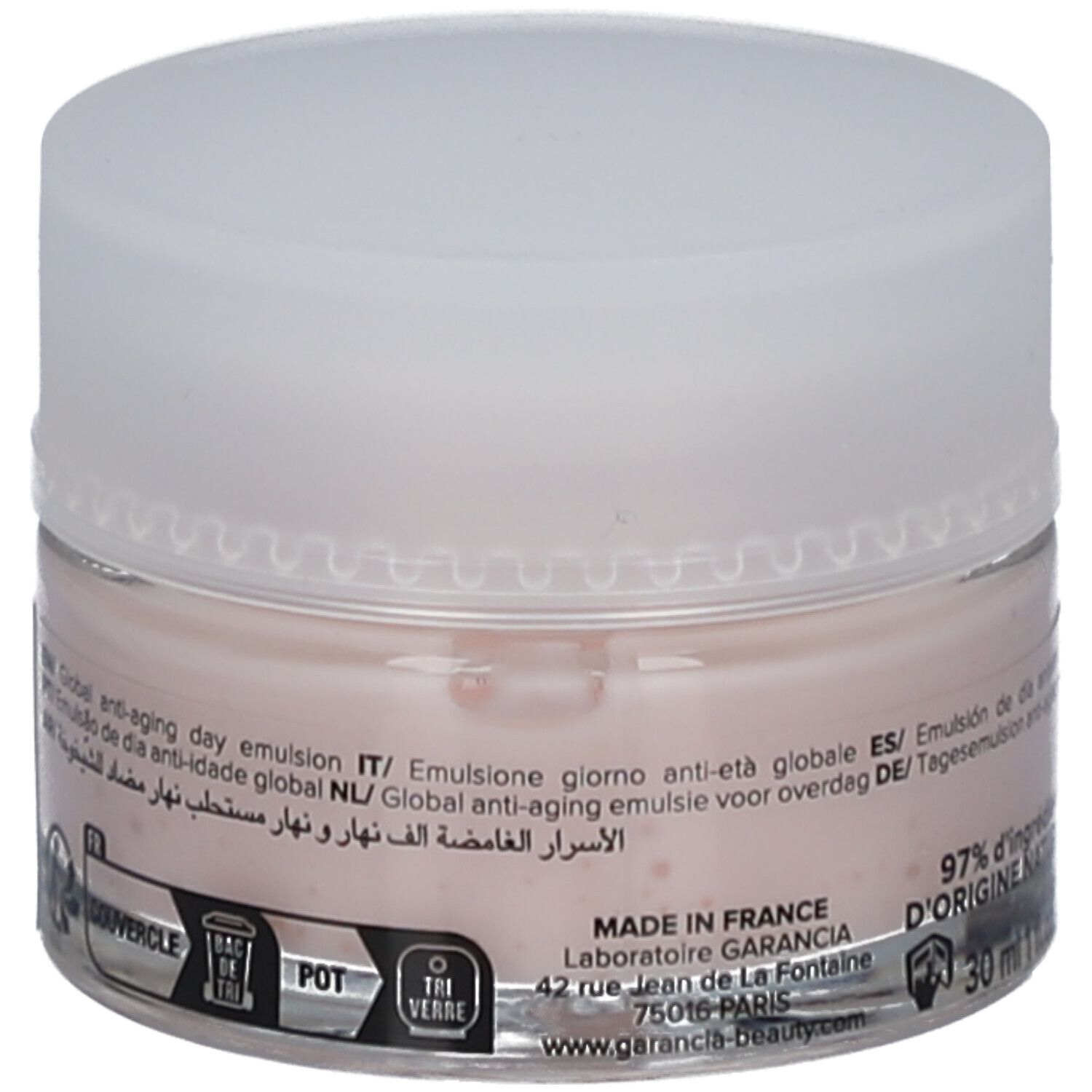 Pot rond avec crème rose et couvercle blanc. Inscription: Made in France. 30 ml. Symboles de recyclage.